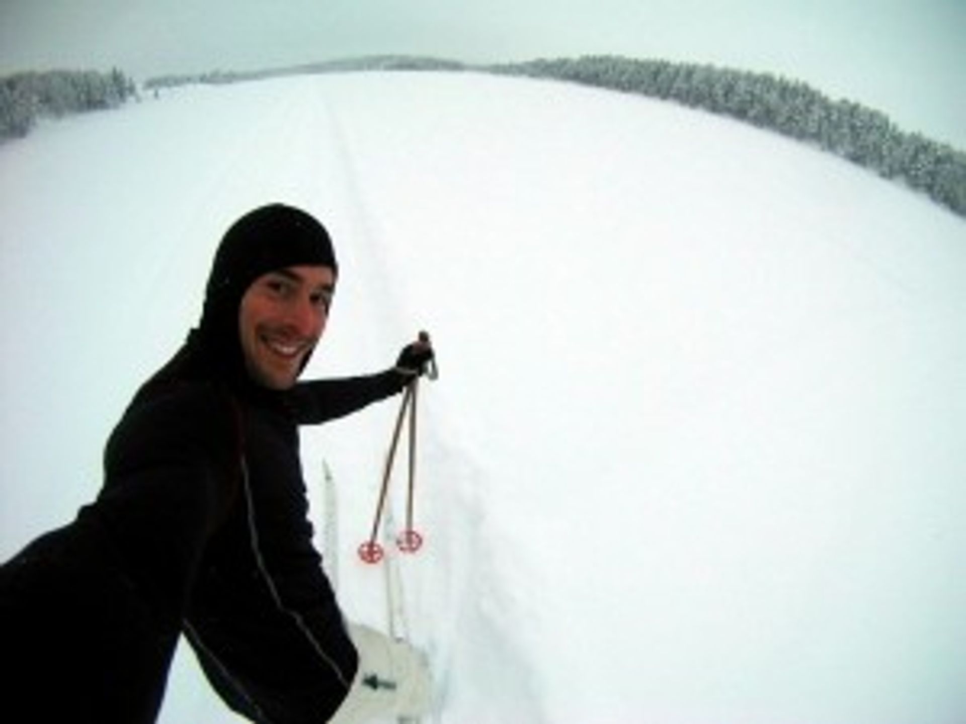 Our ambassador Jesus skiing in the snow.