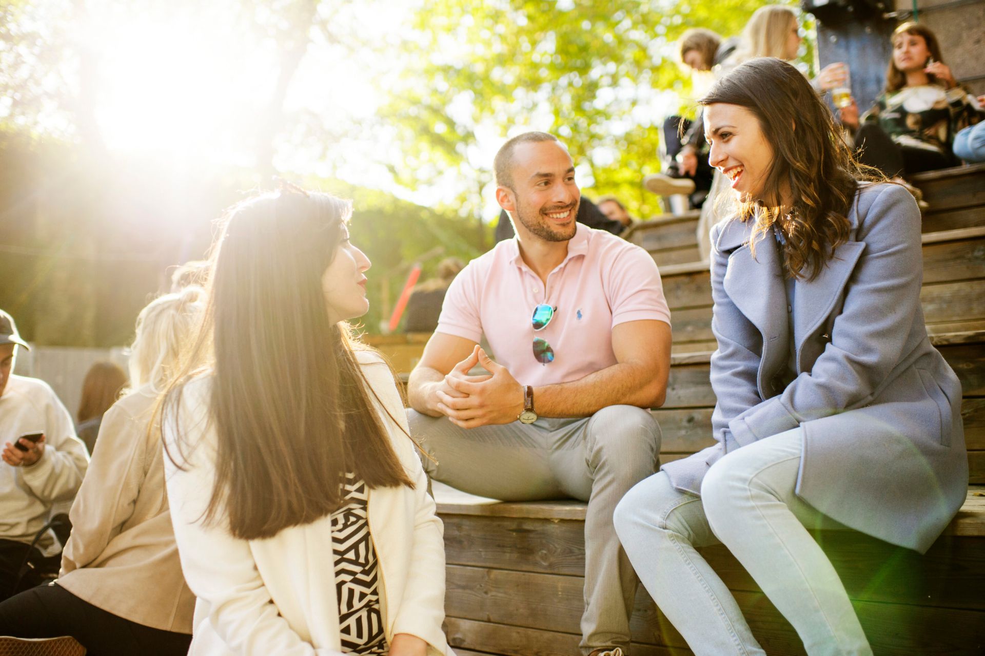 Students sitting in the sun.