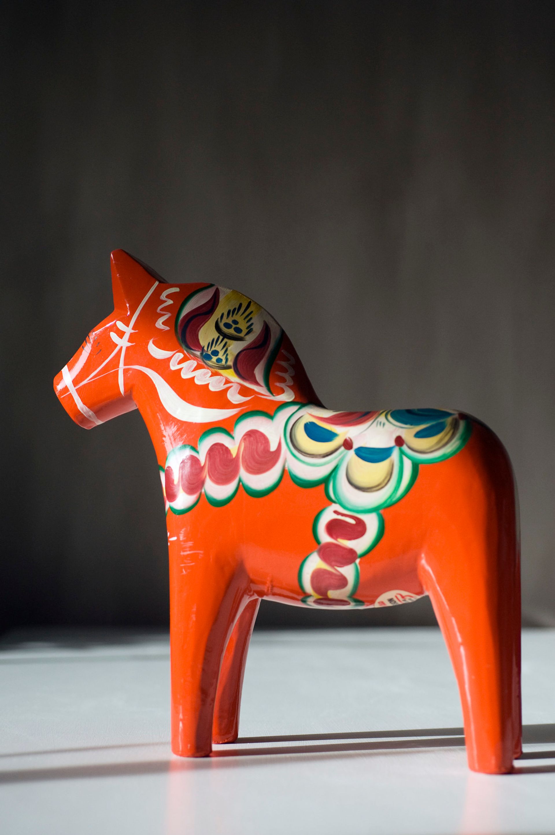 Close up of a red Dala horse.