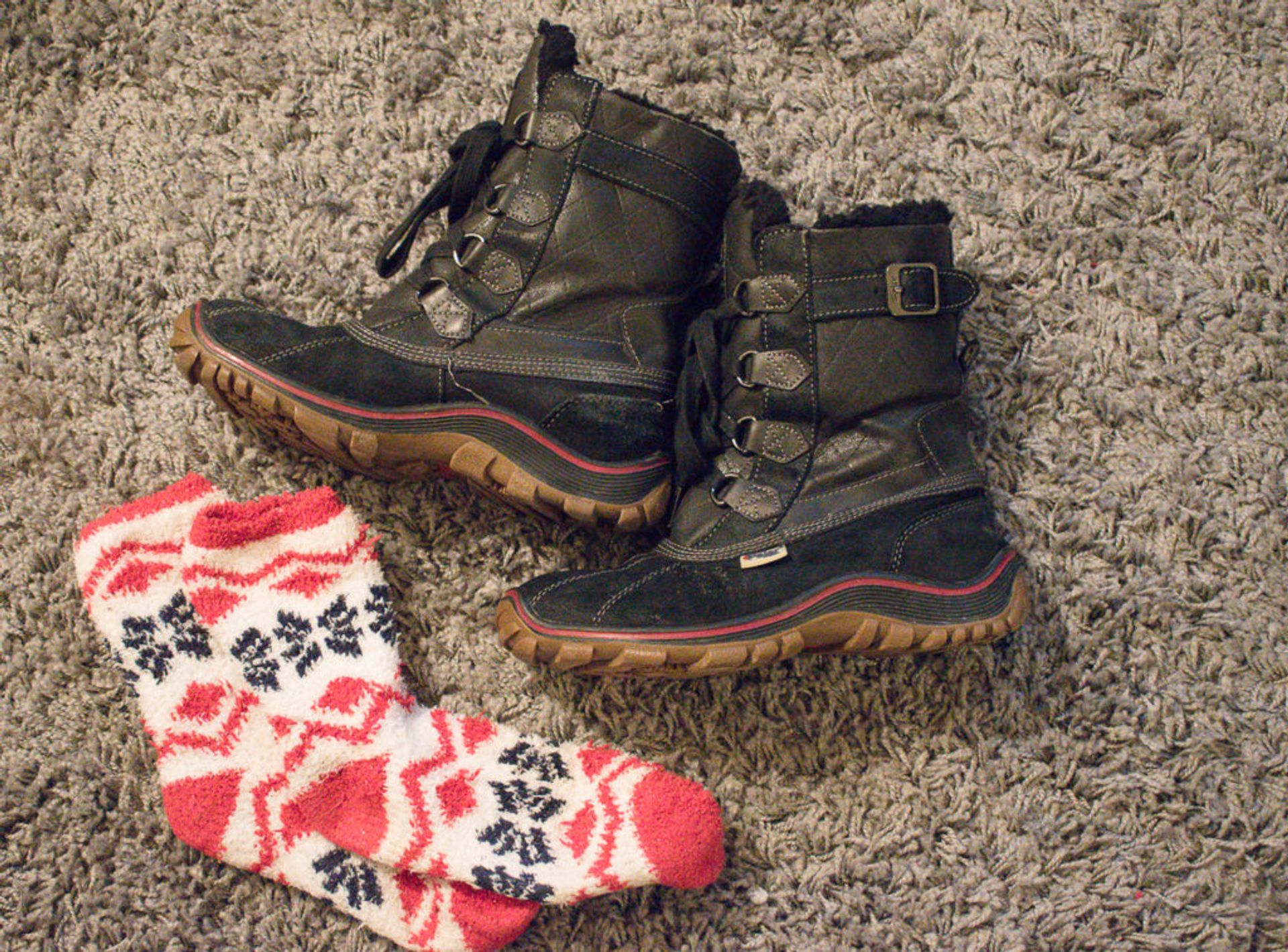 A pair of winter boots and thick socks.