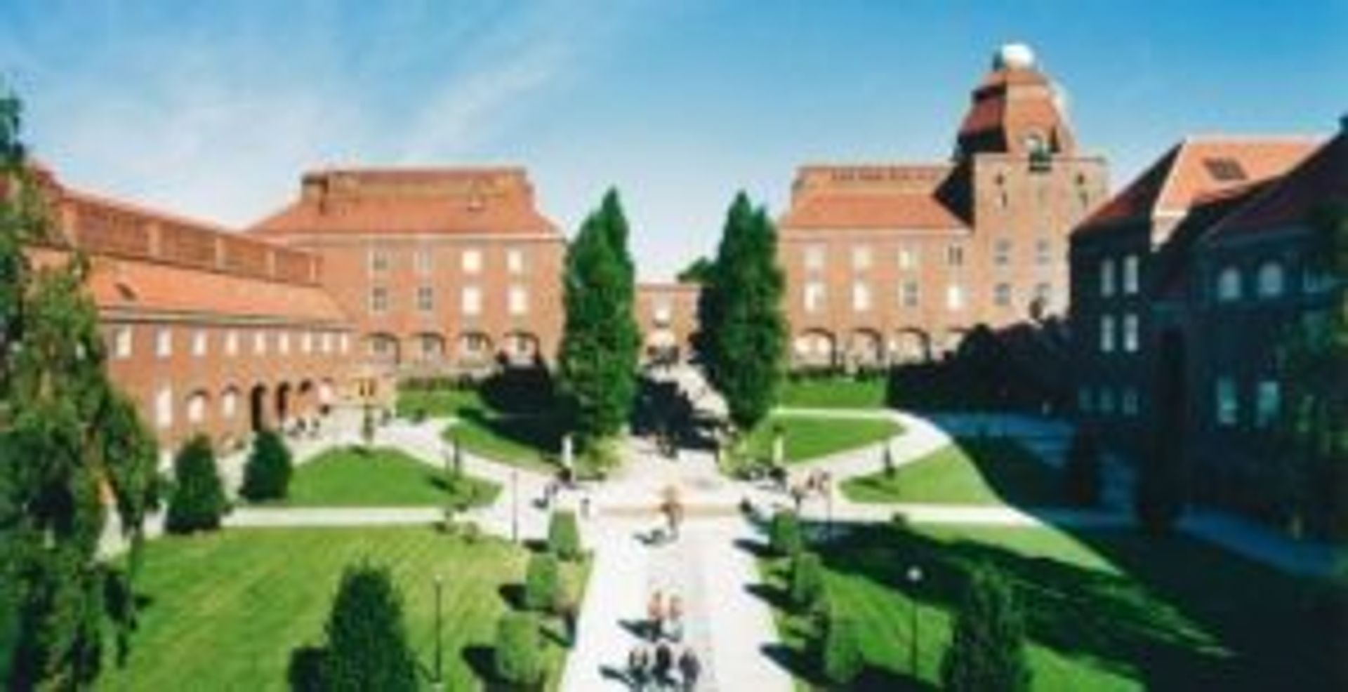 A large red, brick building.