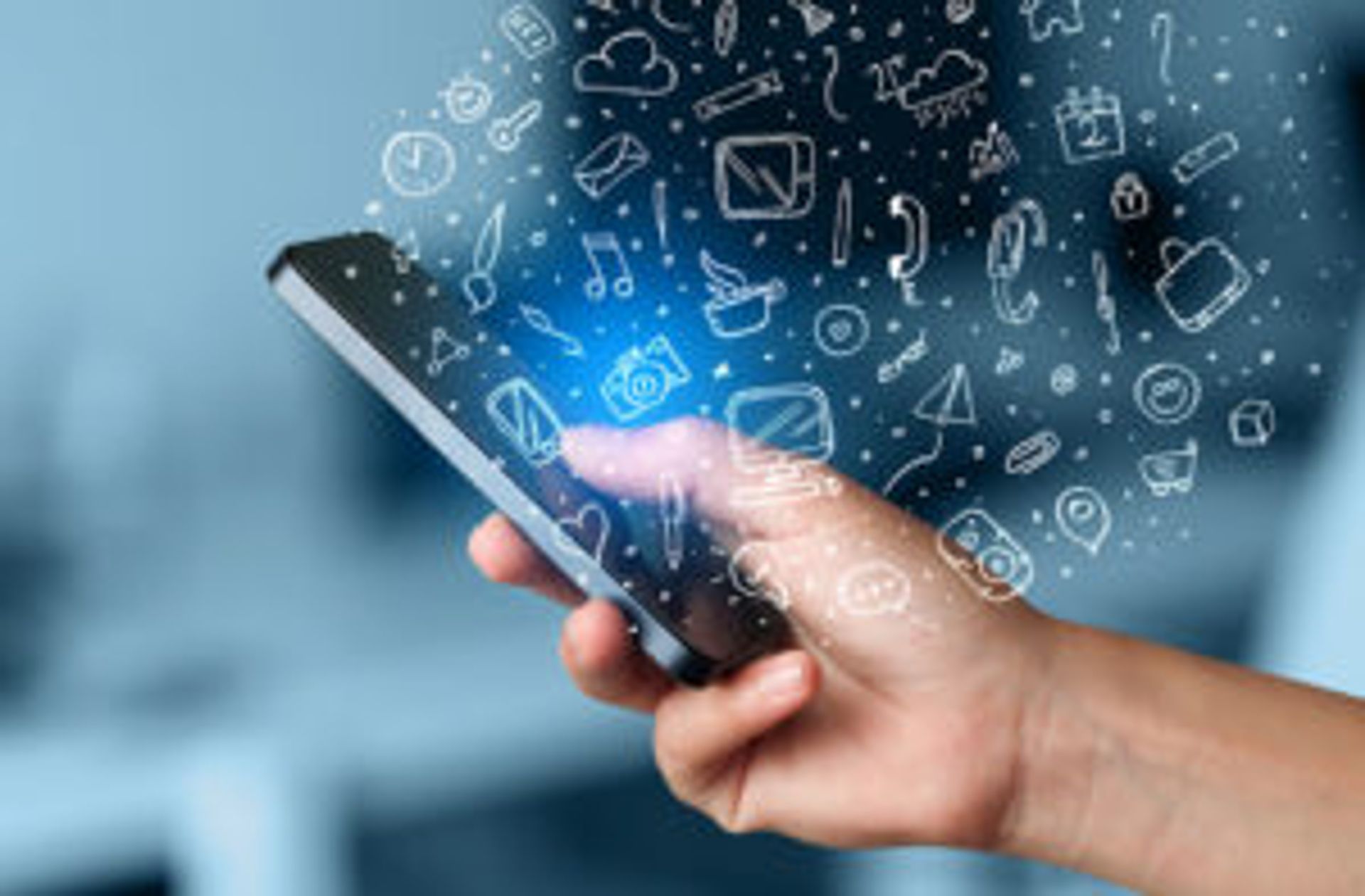 Close-up of a person's hand holding a phone.