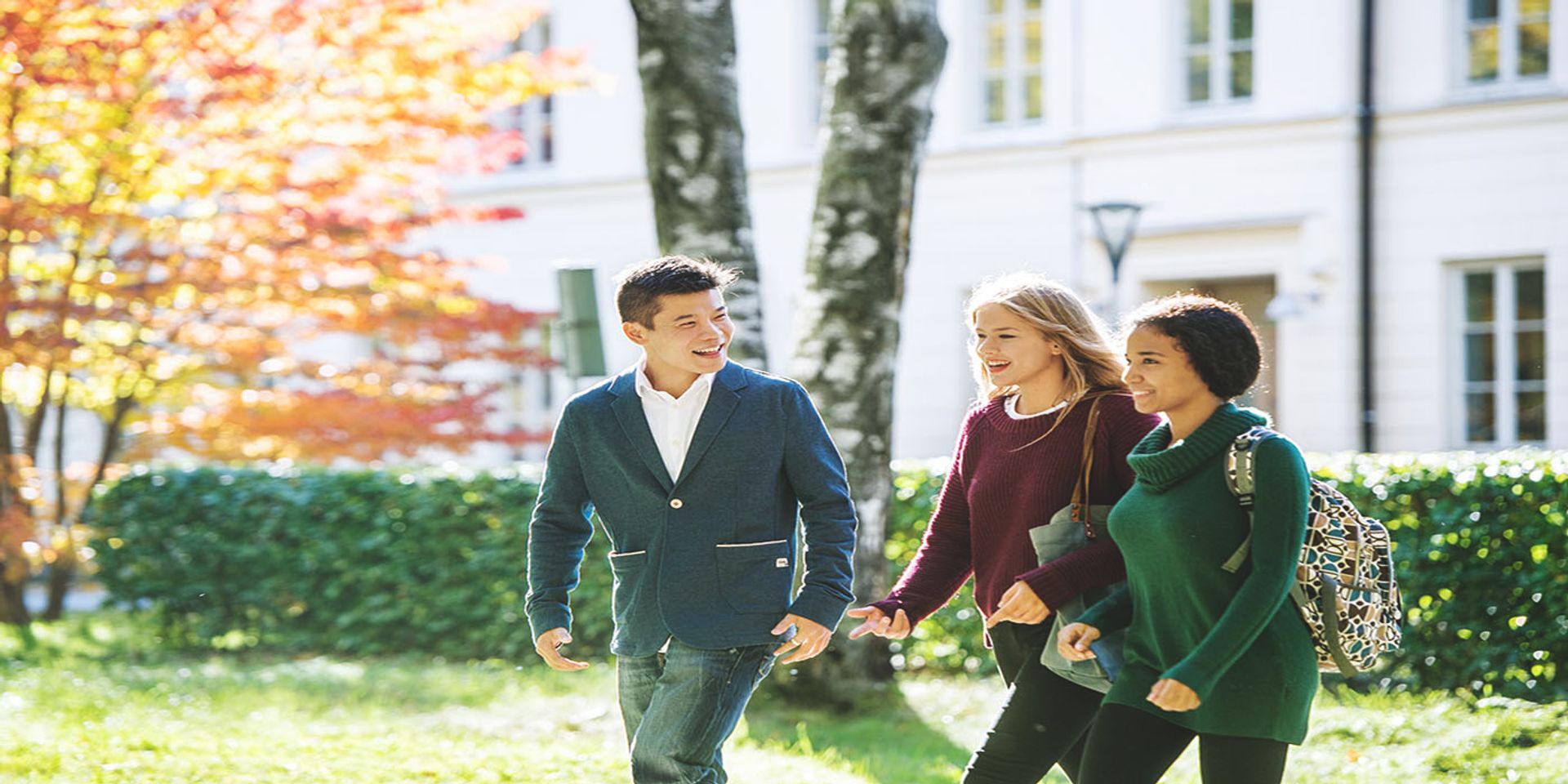 photo of students walking in park