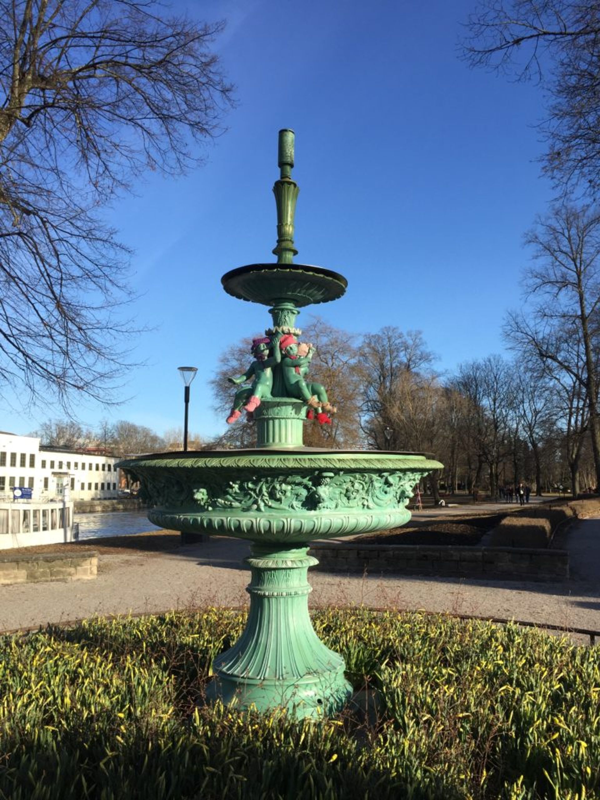 Statue with socks and mittens on