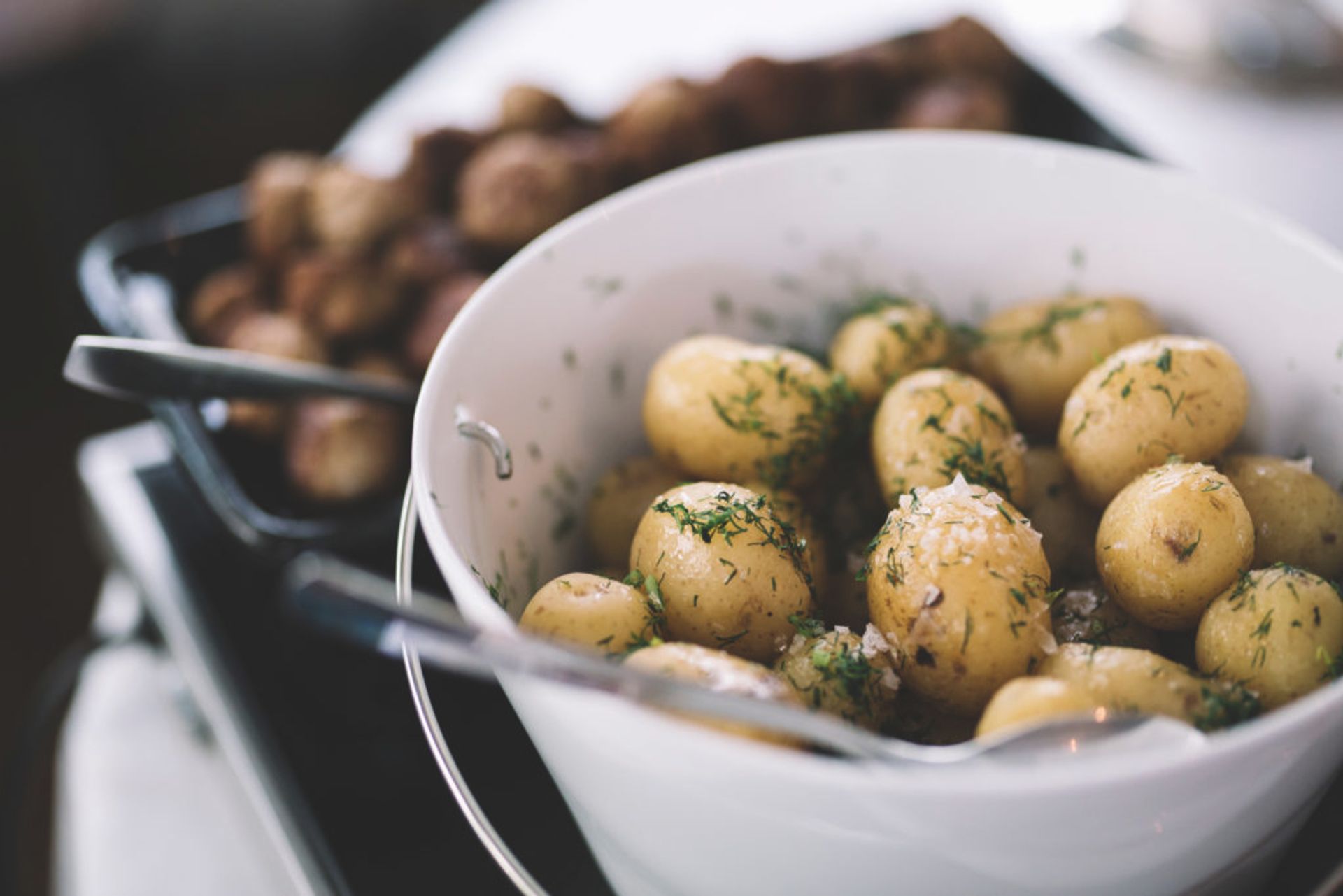 Boiled potatoes with dill (Source: Alexander Hall/imagebank.sweden.se)