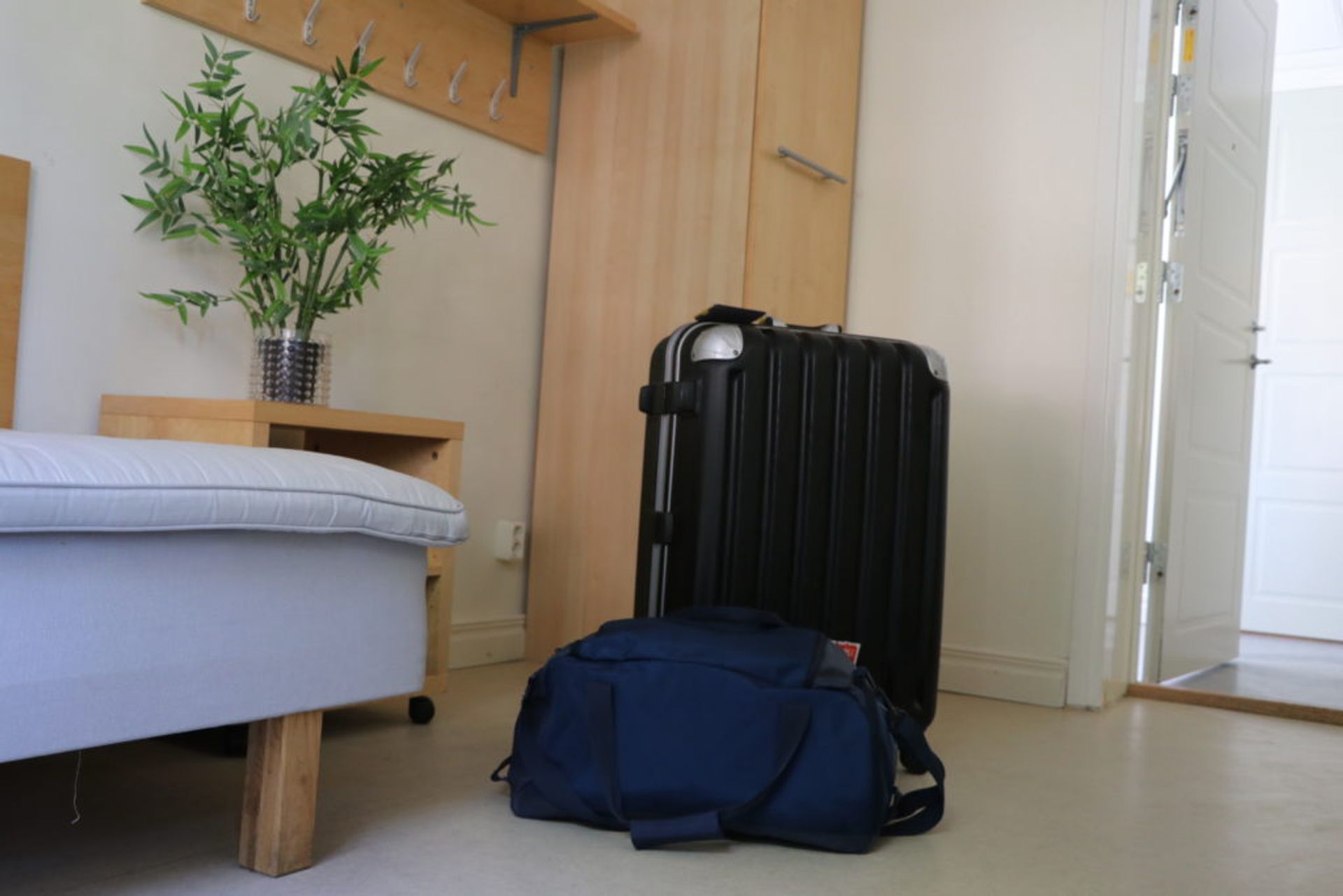 Photos of suitcases showing that travelling light can make things easier on arrival day