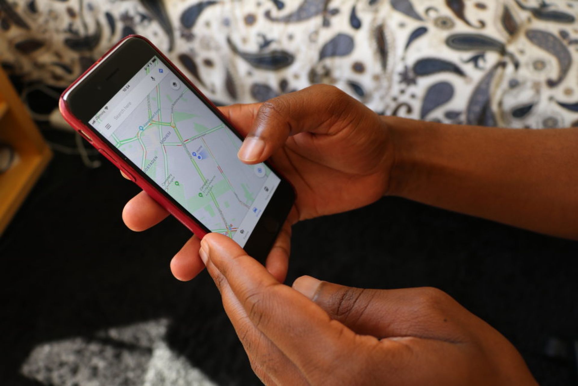 A close-up of a smartphone with an offline Google maps on the screen.