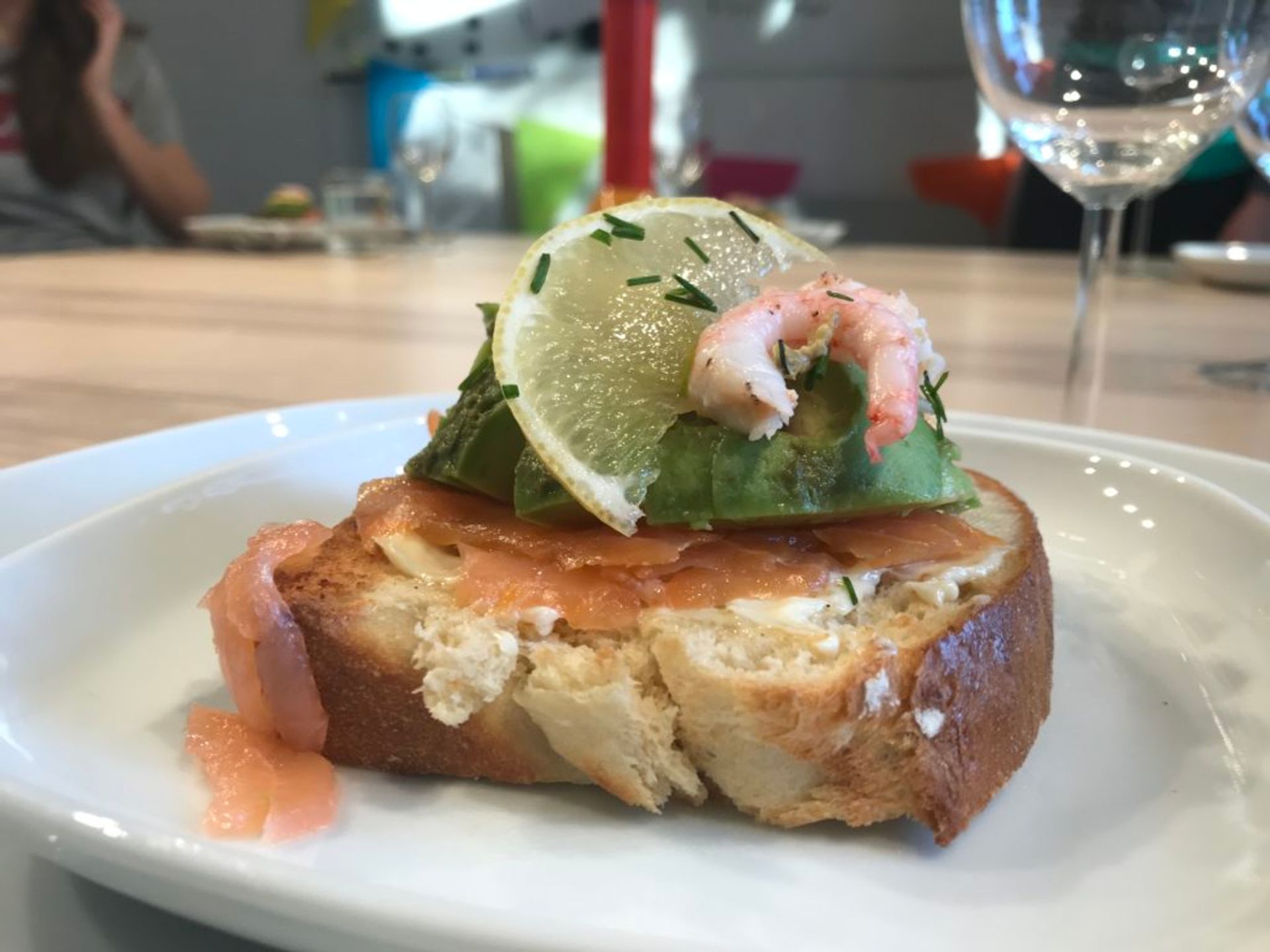 a photo of salmon avocado toast