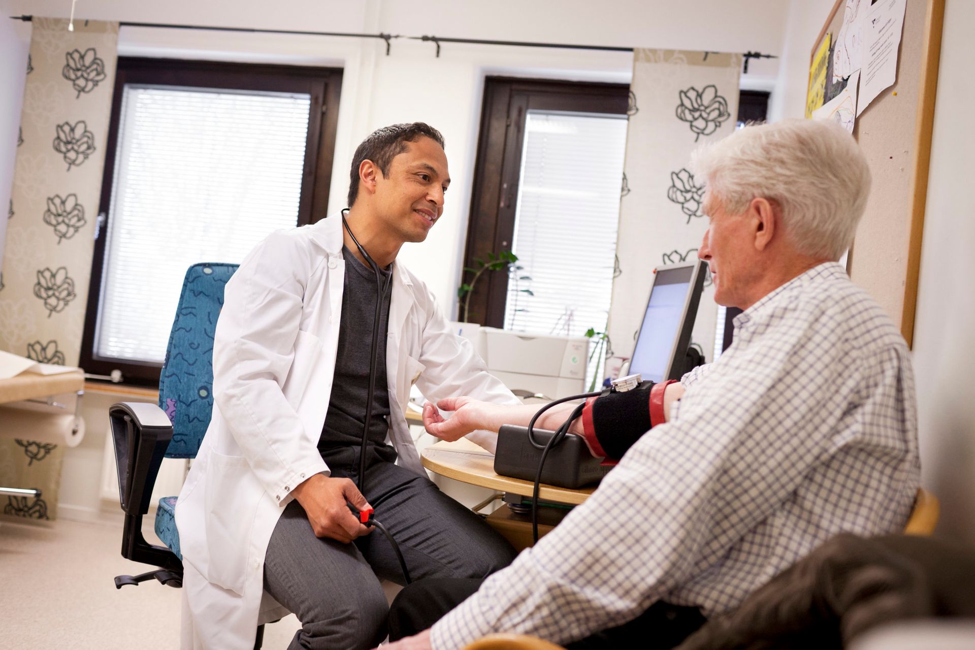 A doctor talking to a patient.