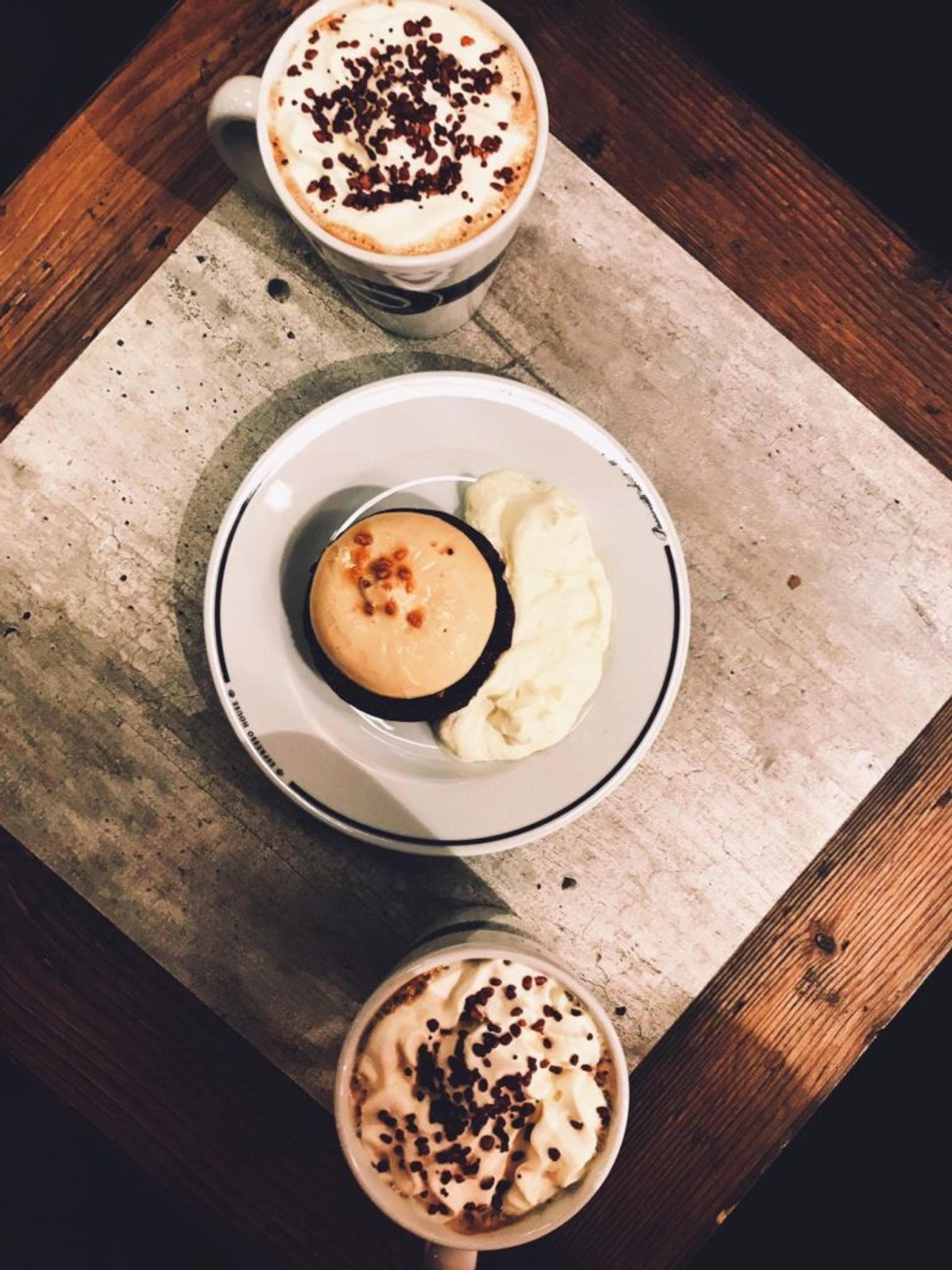 Cake and a coffee on a table.