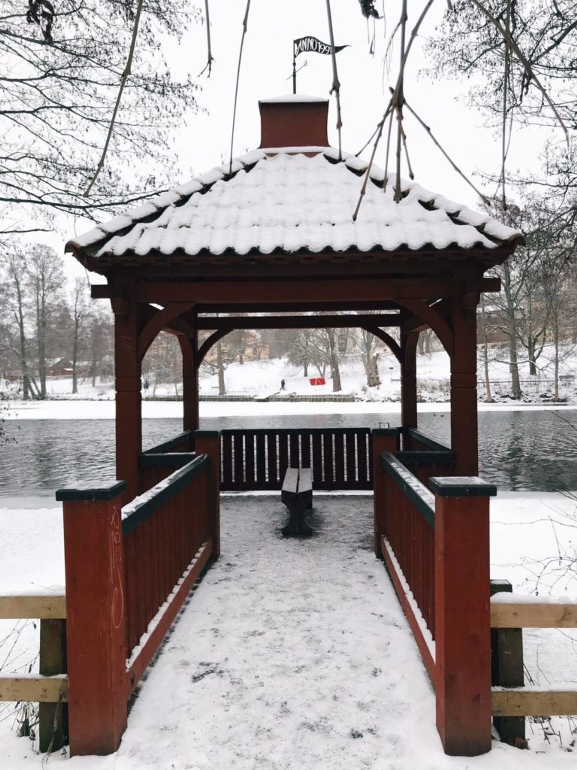 Wooden benches beside the river.