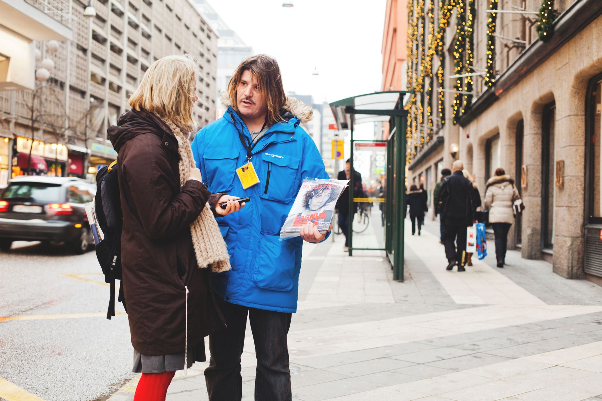 Two people talking.