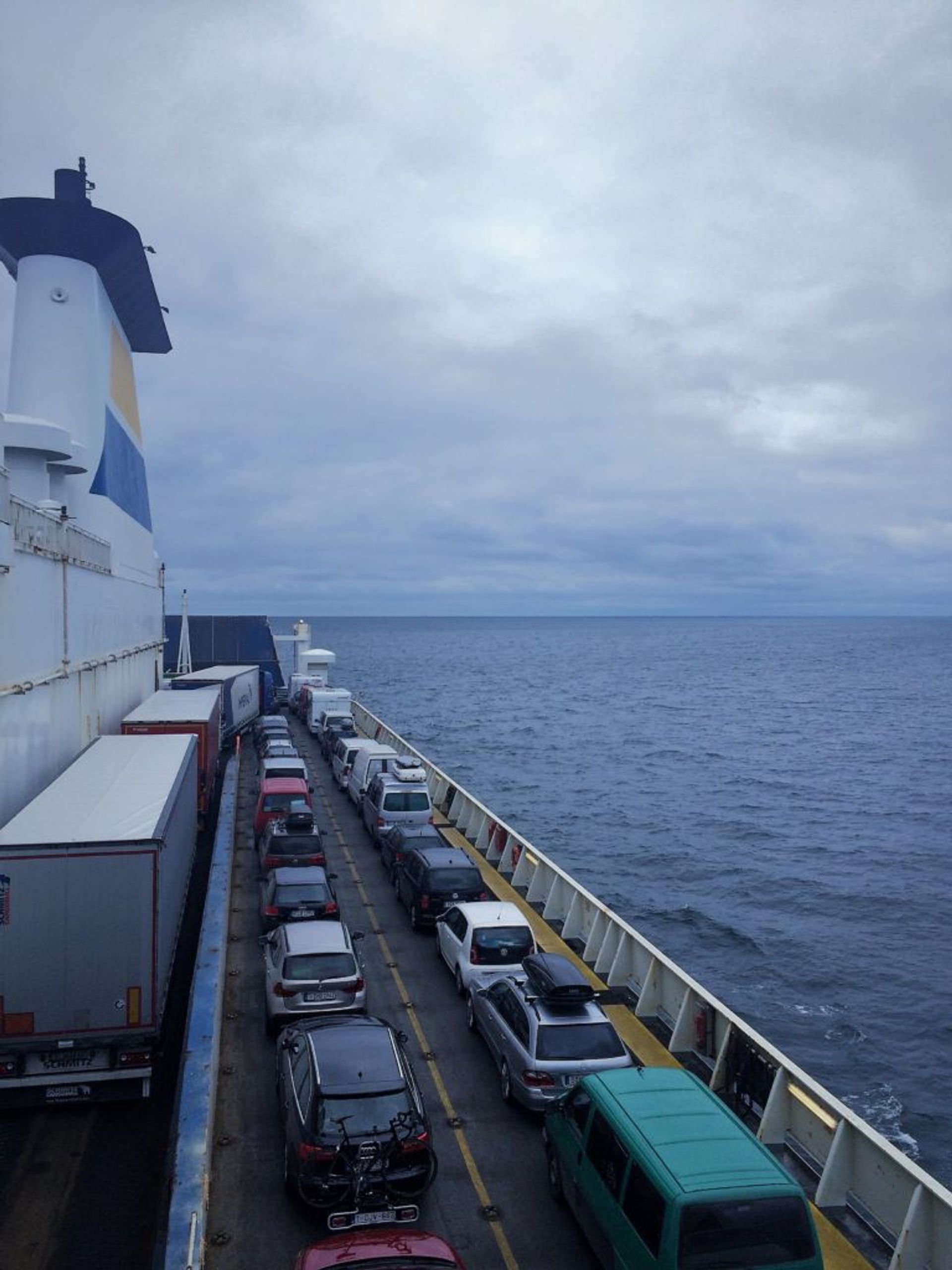 Lorries and cars on a ferry.
