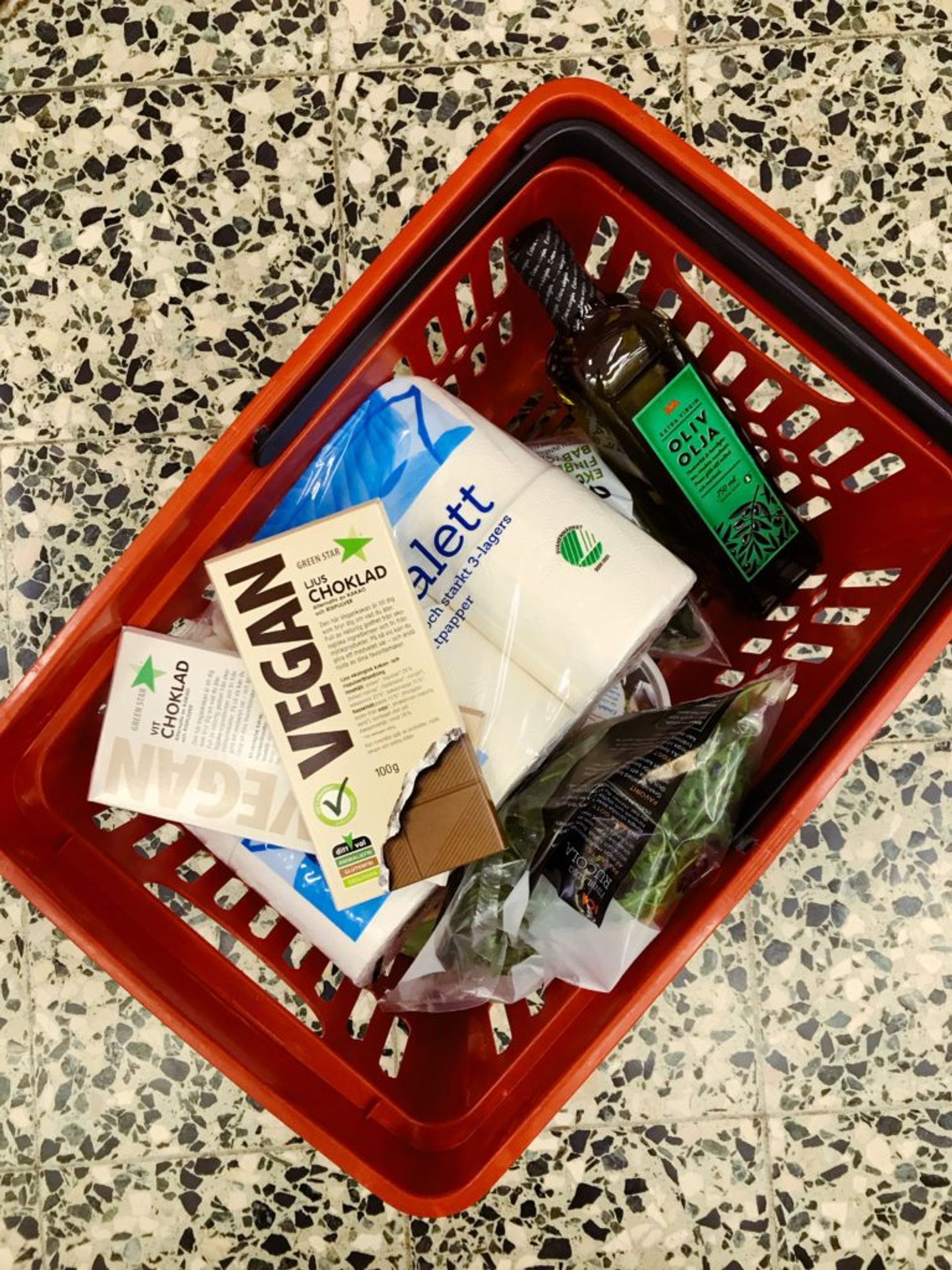 Shopping basket full of food.