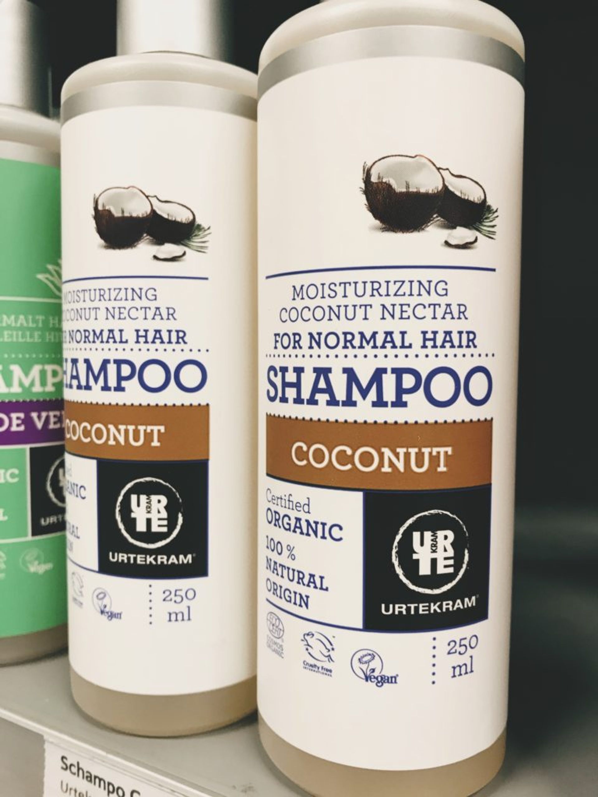 Close up of vegan shampoo bottles.