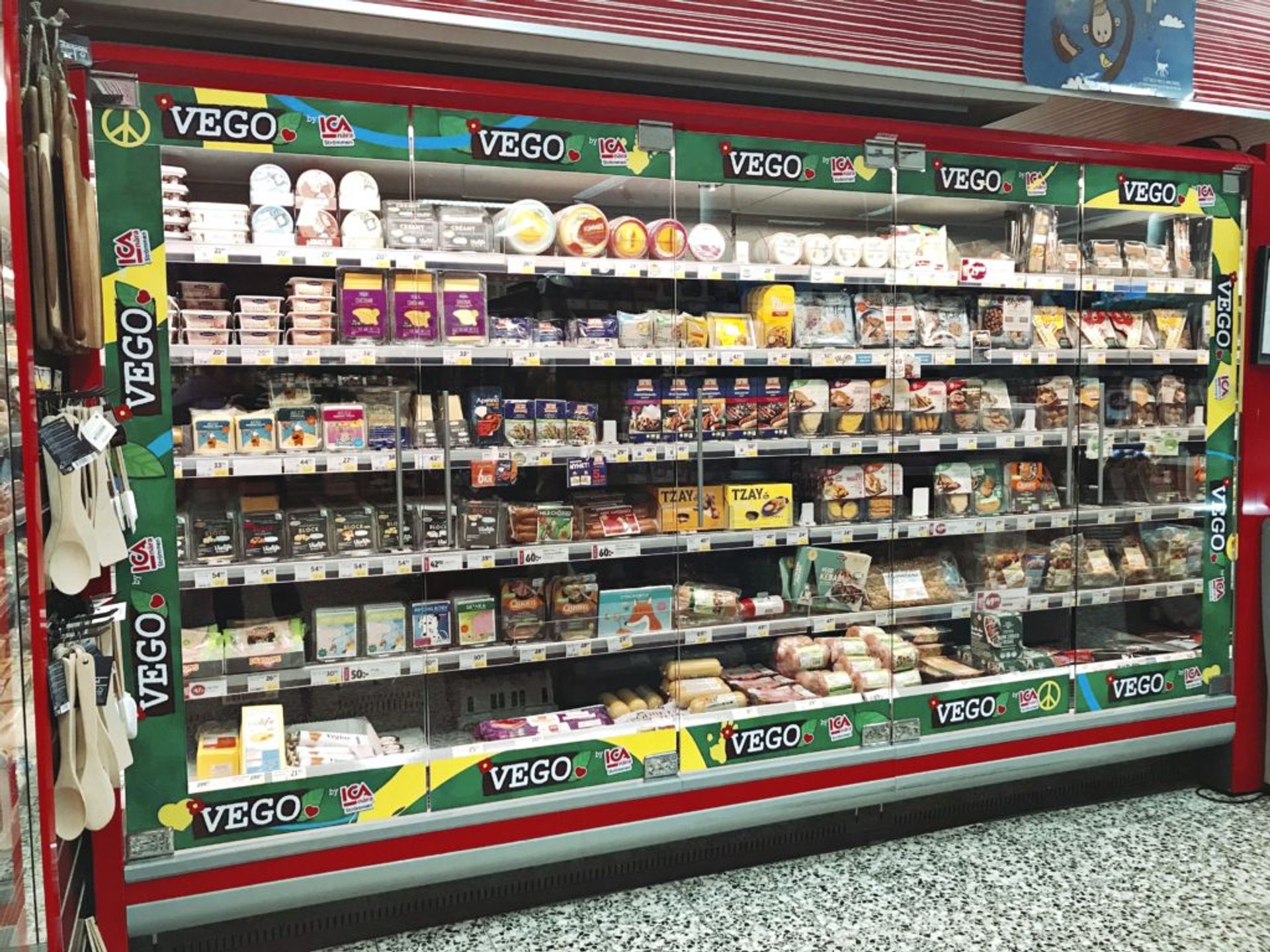 Shelves of frozen vegetarian food in a supermarket.