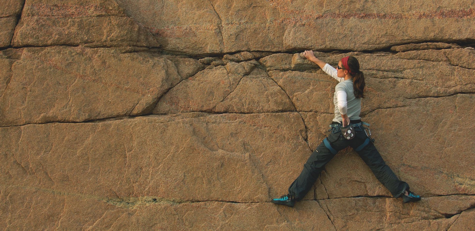 Woman rock climbing