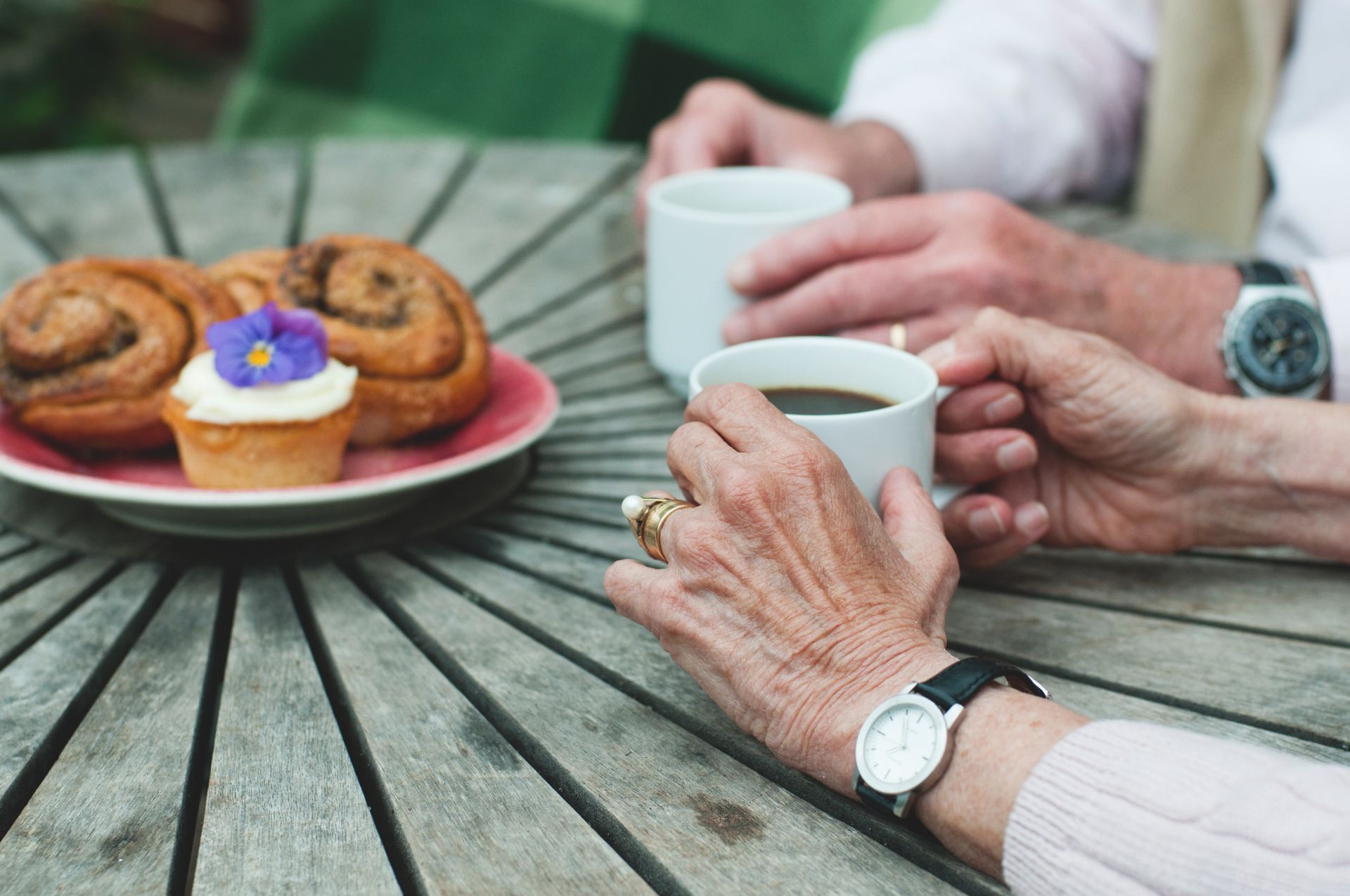 Close-up of coffee and pastries.