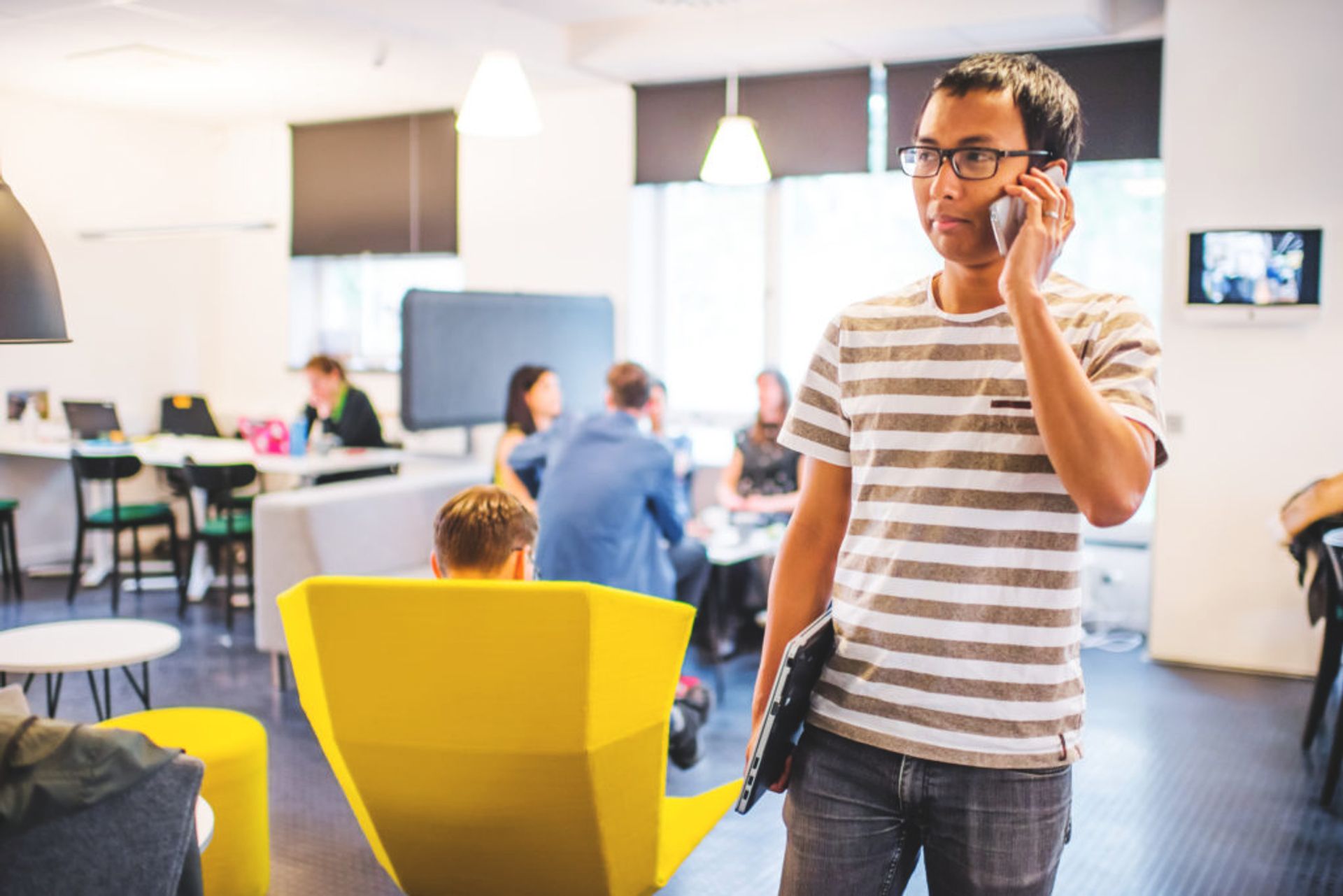 Young man talking on the phone.