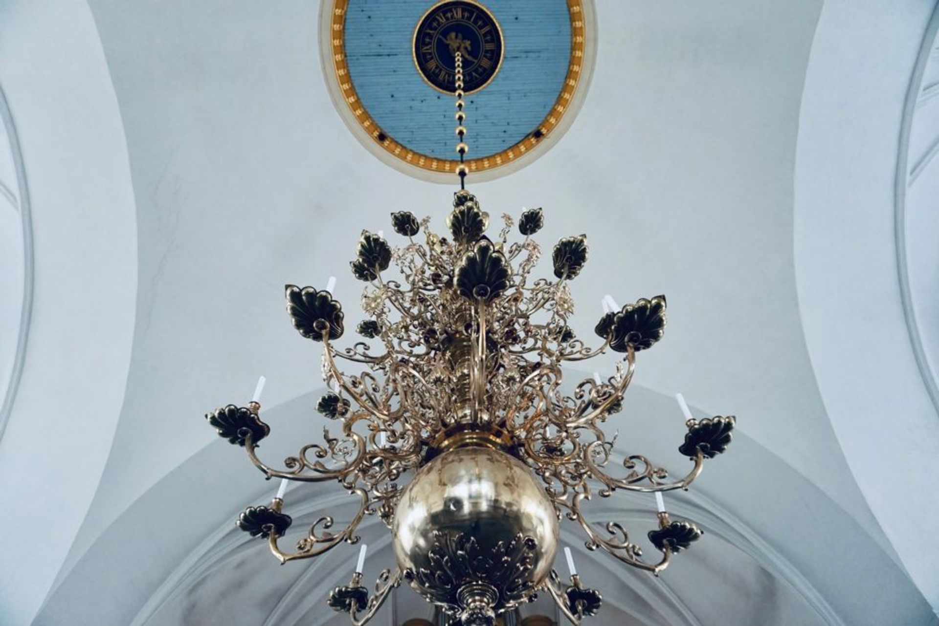 A chandalier in a church.