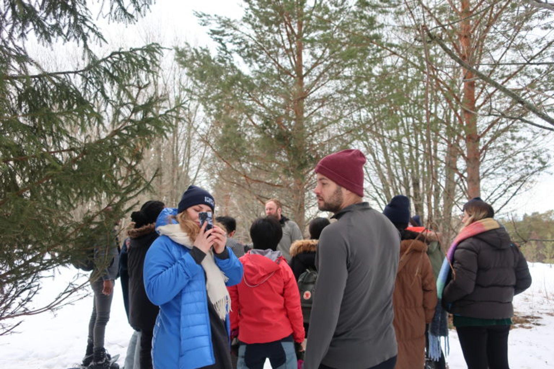 The Study in Sweden team in the forest on a snowy day.