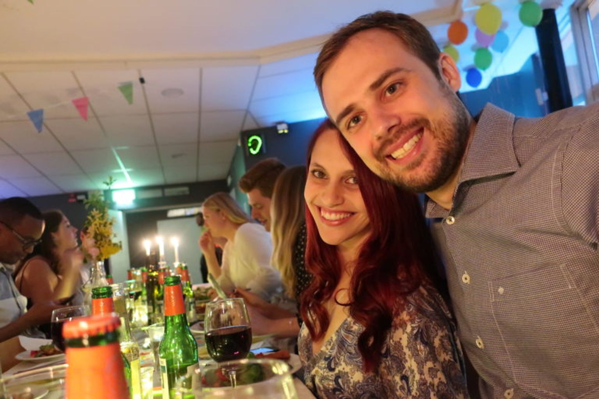 Students posing for a photo at a dinner.