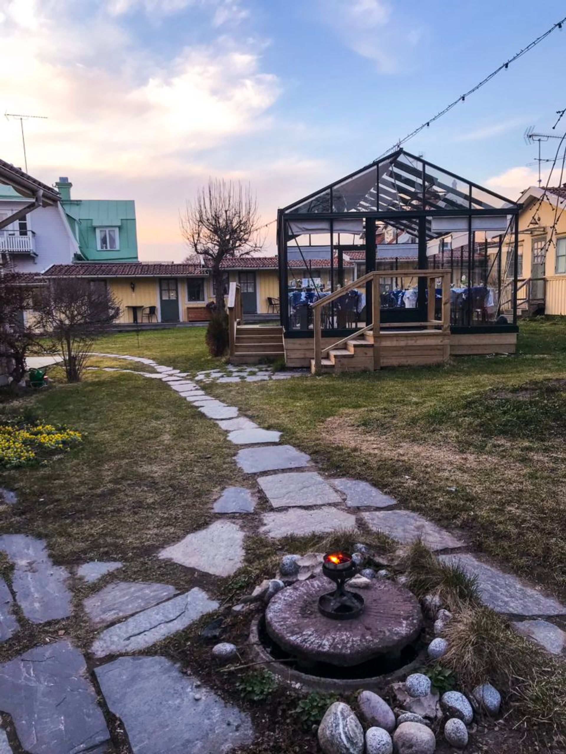 Glasshouse in a garden.