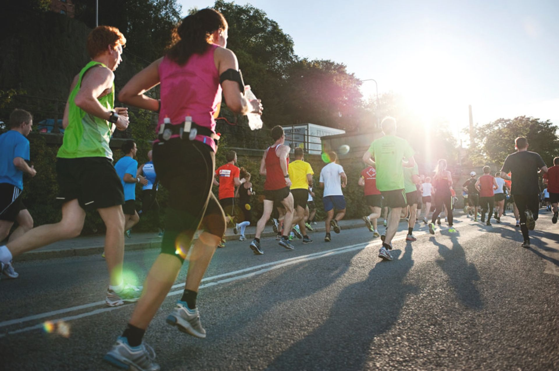 Men and women running a marathon.