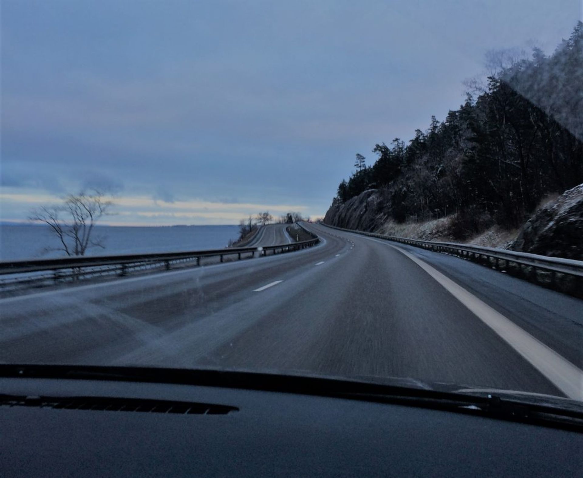 View of a road from a car.