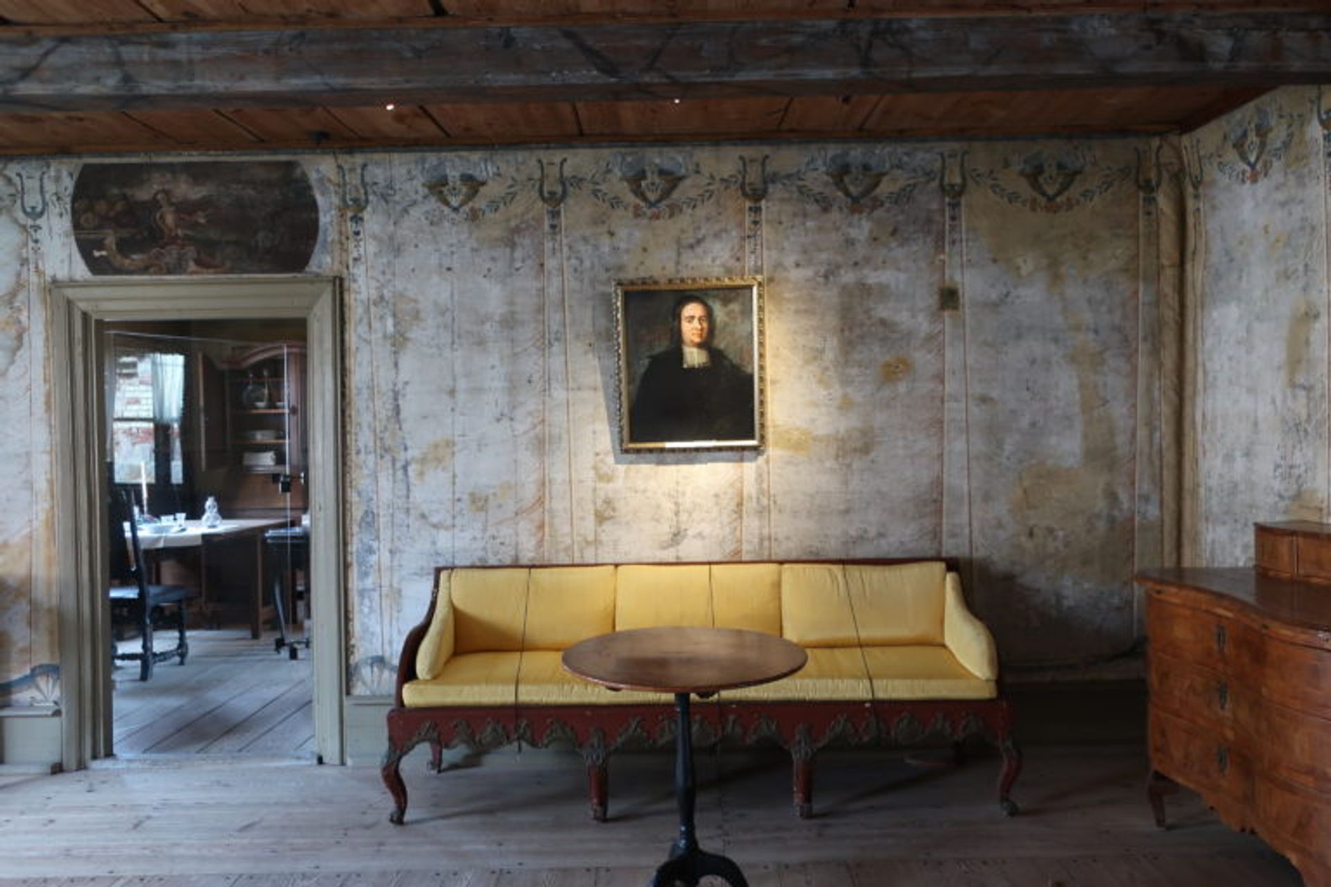 A sitting room in an old house.