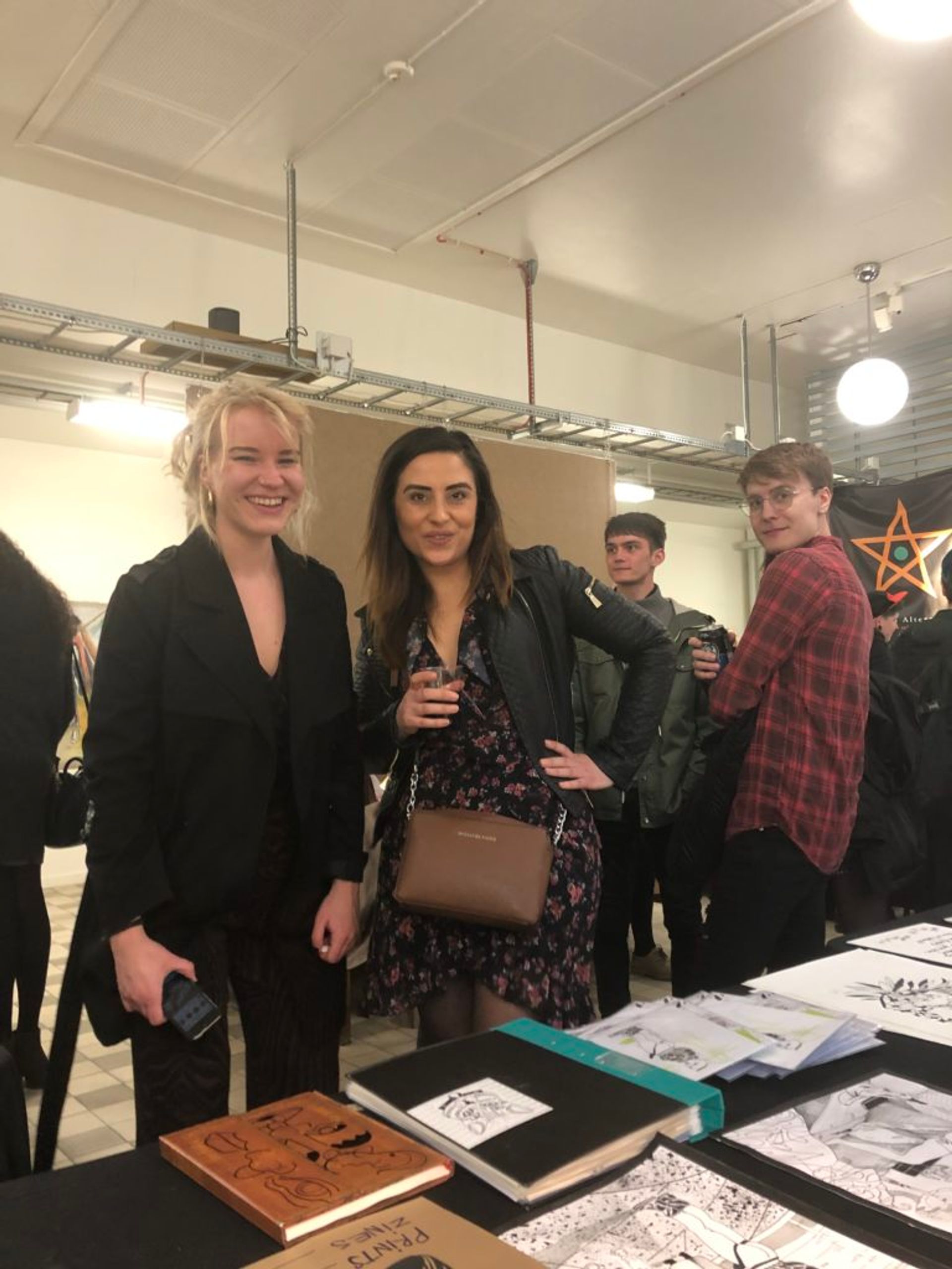 Students posing for a photo at an art festival.