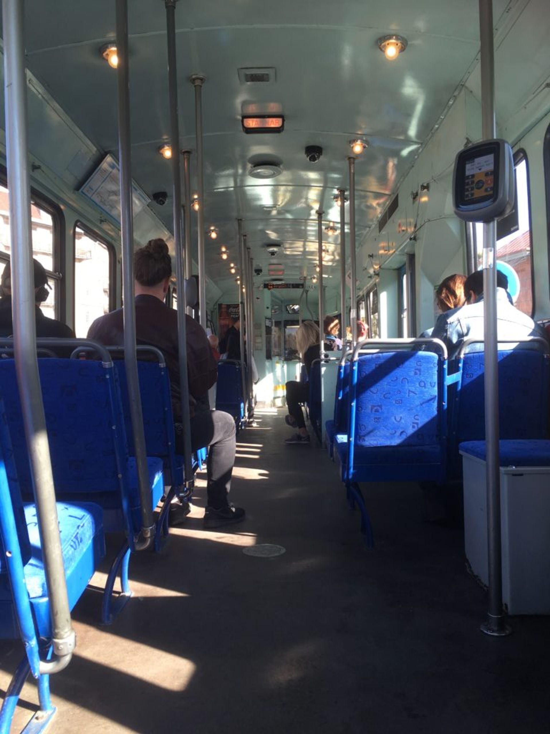 People sitting on a Gothenburg tram.