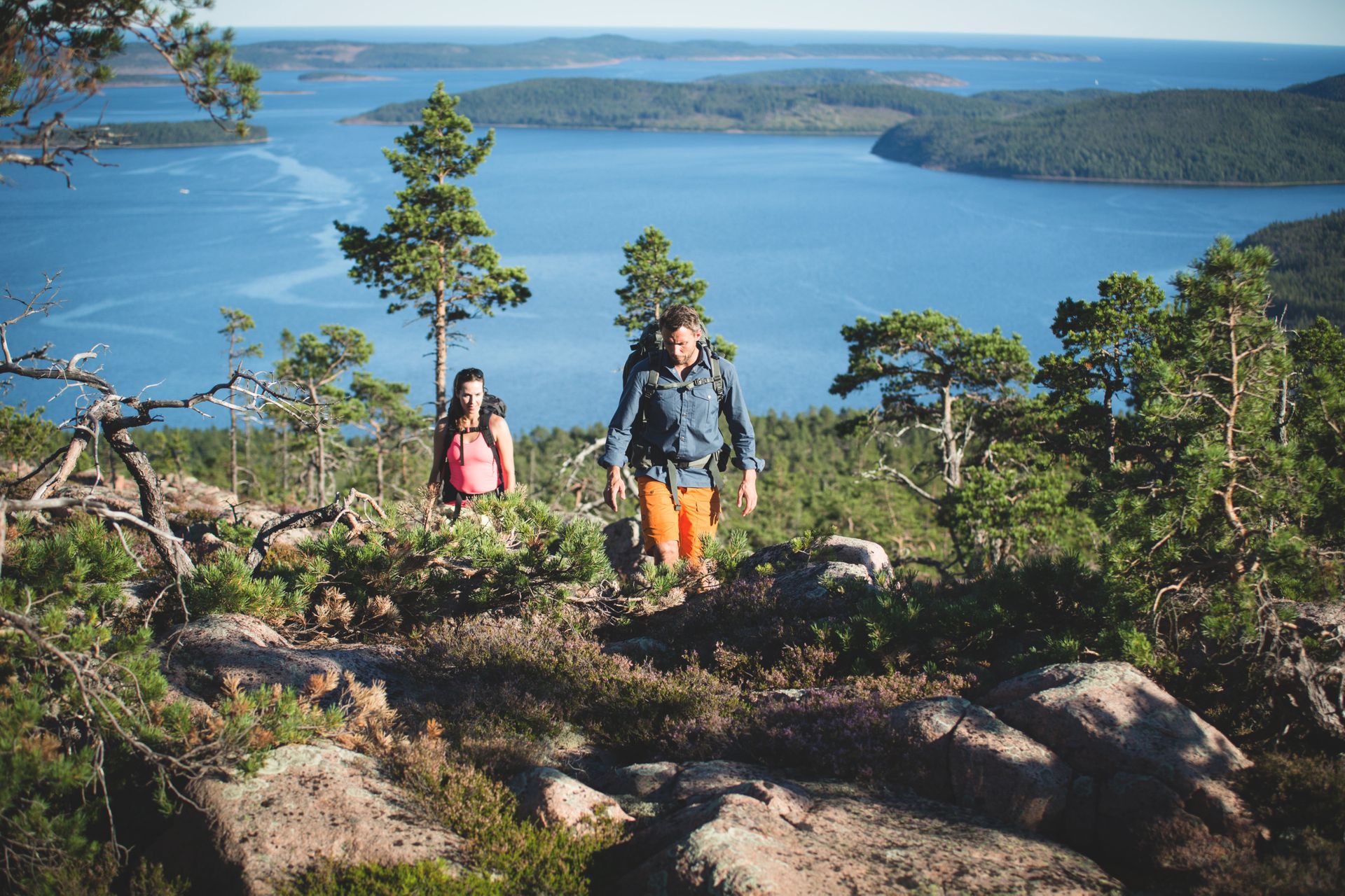 Two people hiking in the mountains.