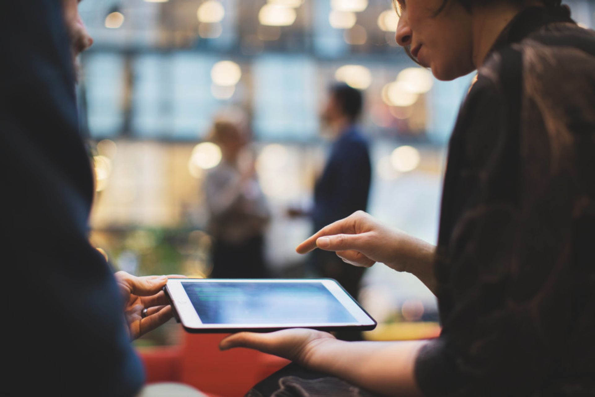 Person looking at an iPad.