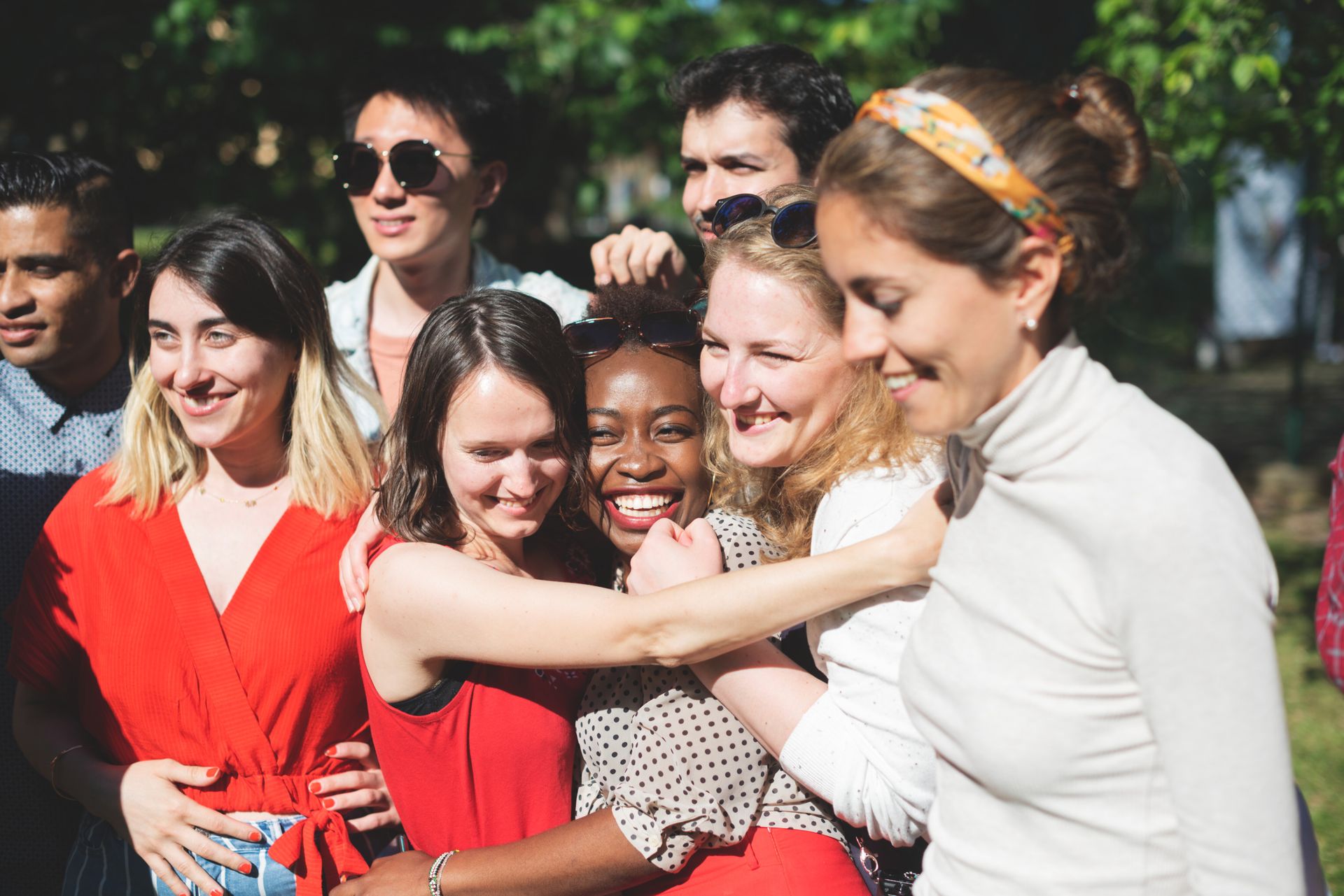 A group of students hugging.