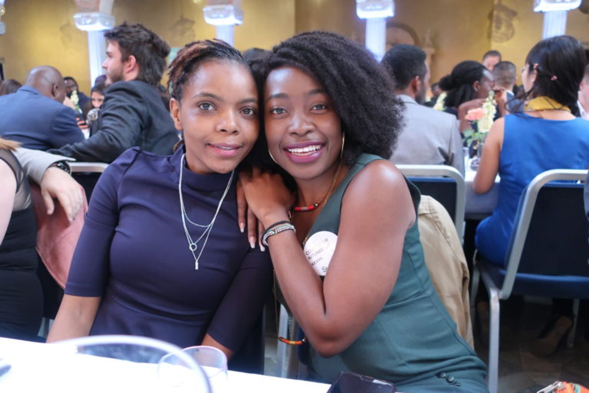 Two students posing for a photo together.