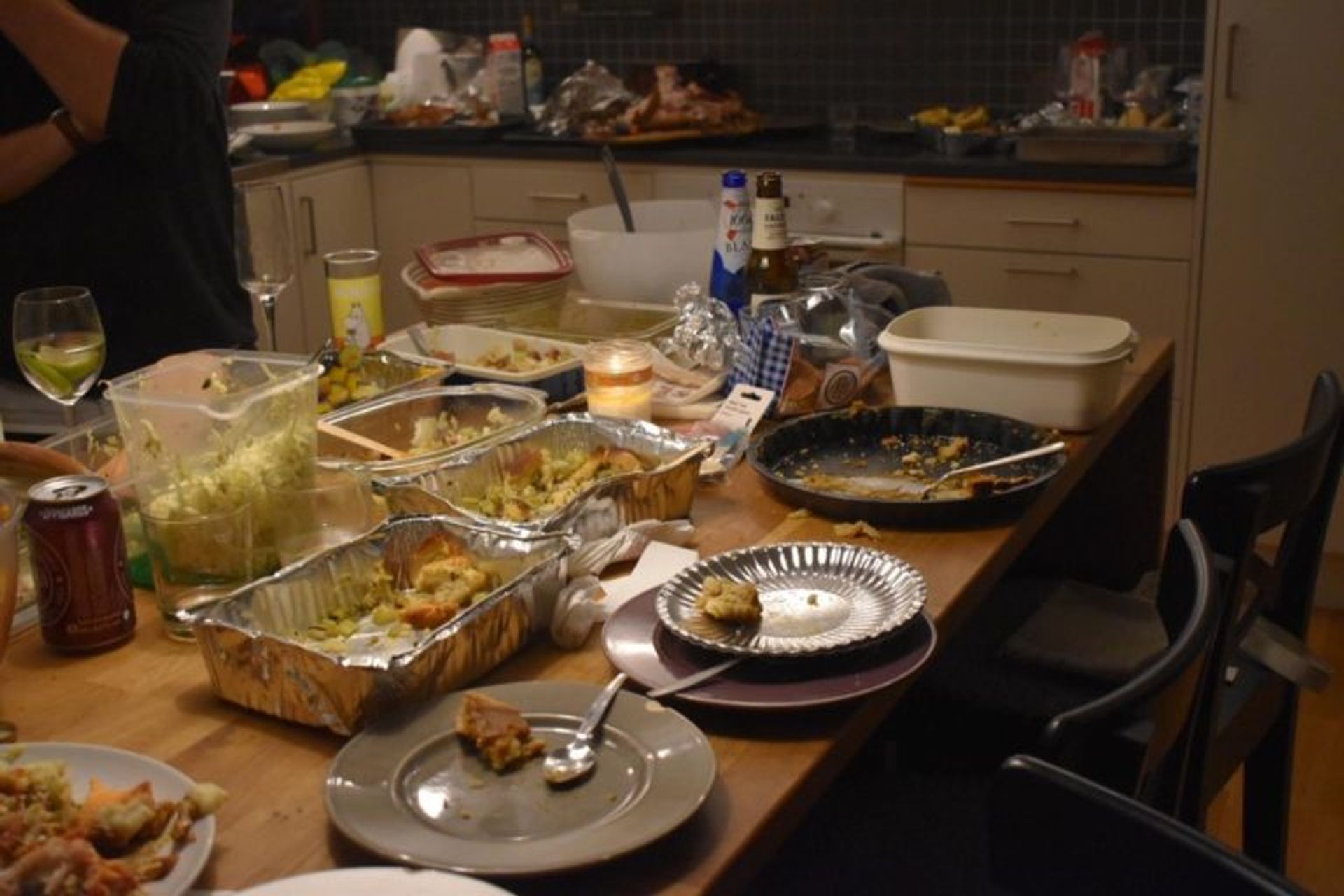 Empty plates on a dinner table.