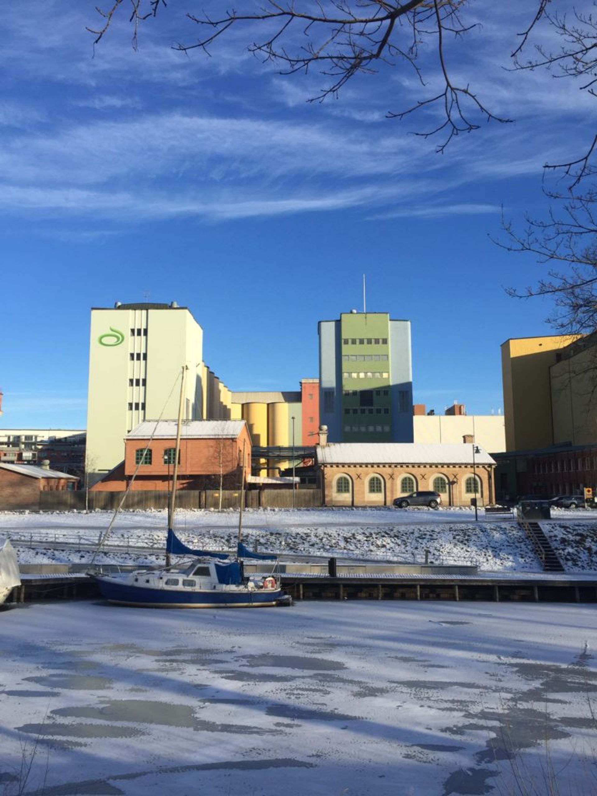Industrial buildings and frozen river in Uppsala 