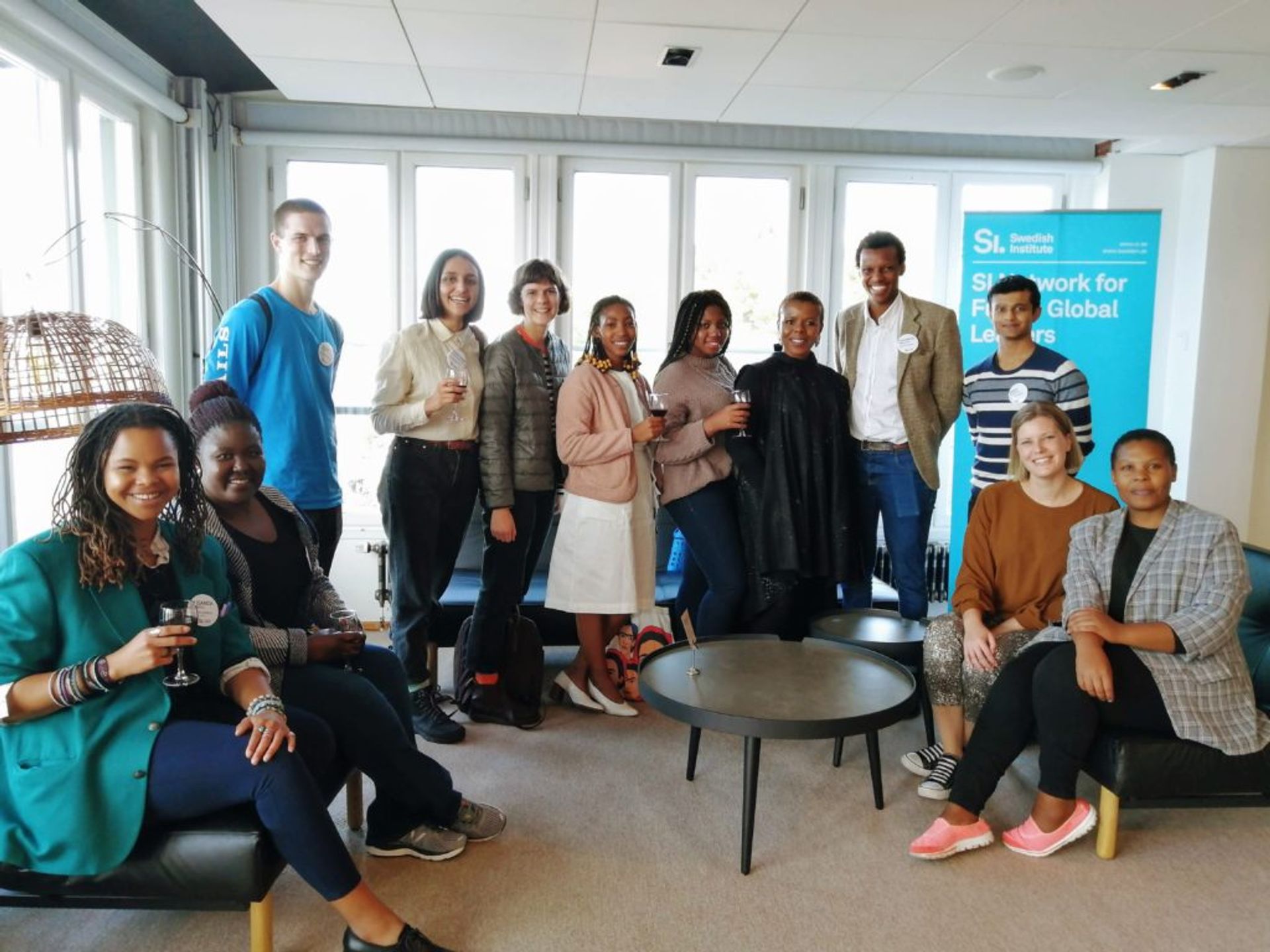 A large group of students pose for a photo.