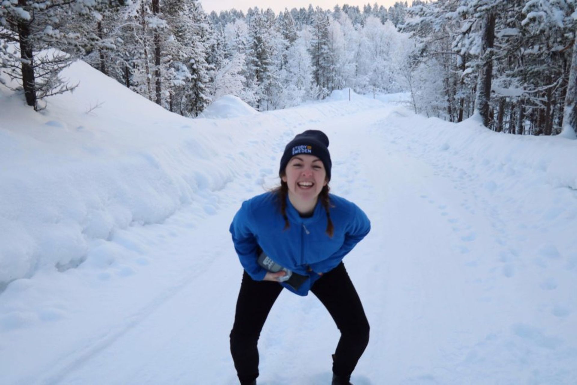 Happy woman in the winter 