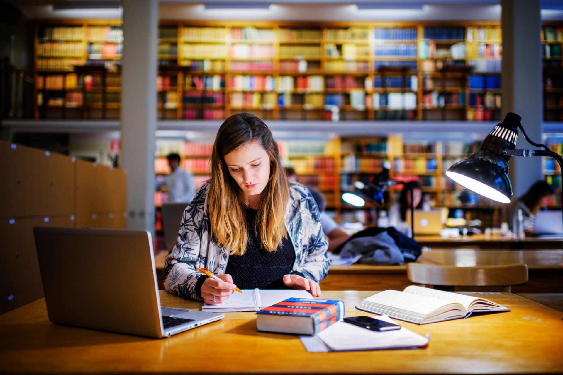 Person studying in a university library.