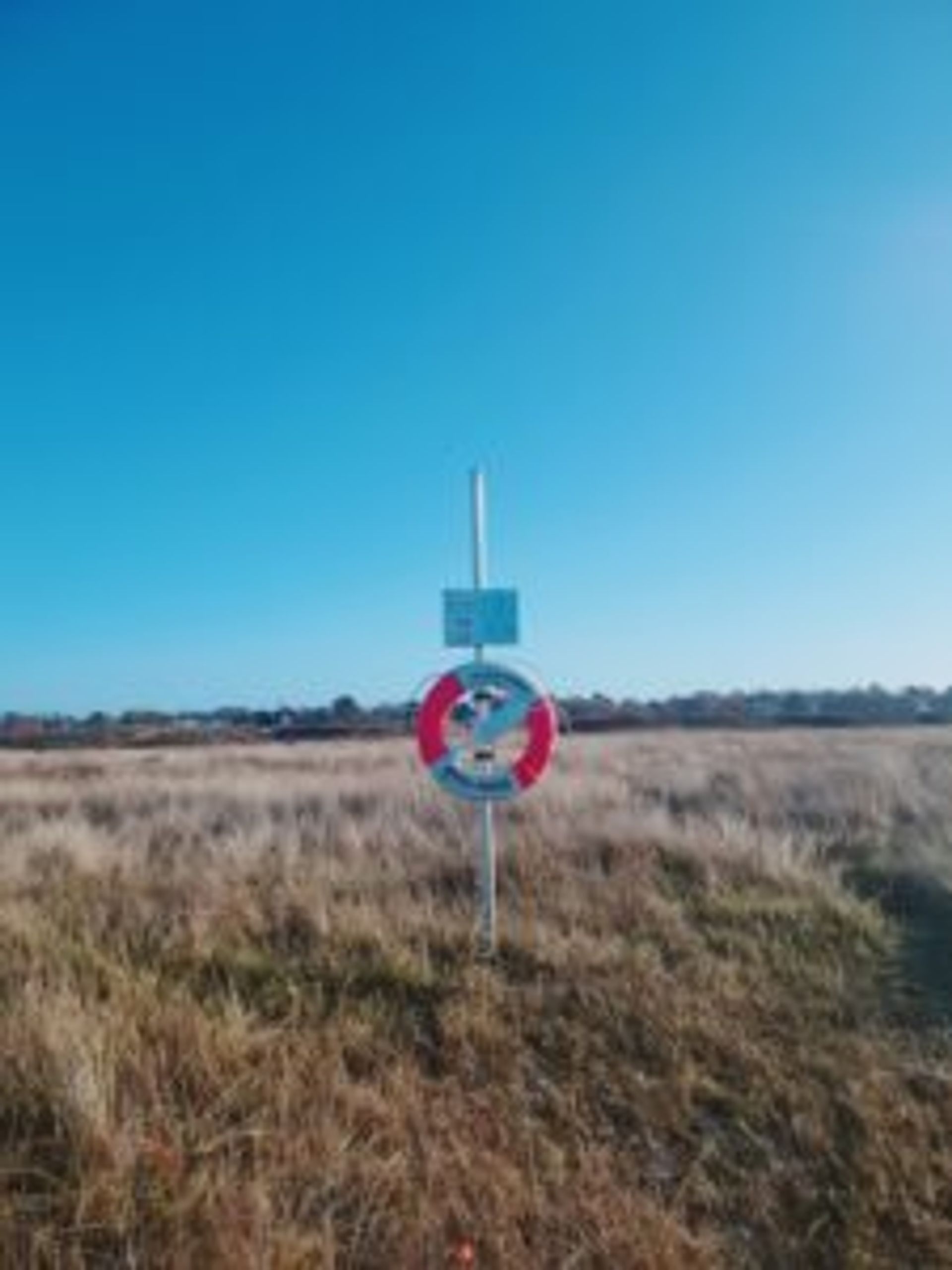 A sign with a lifebelt attached.