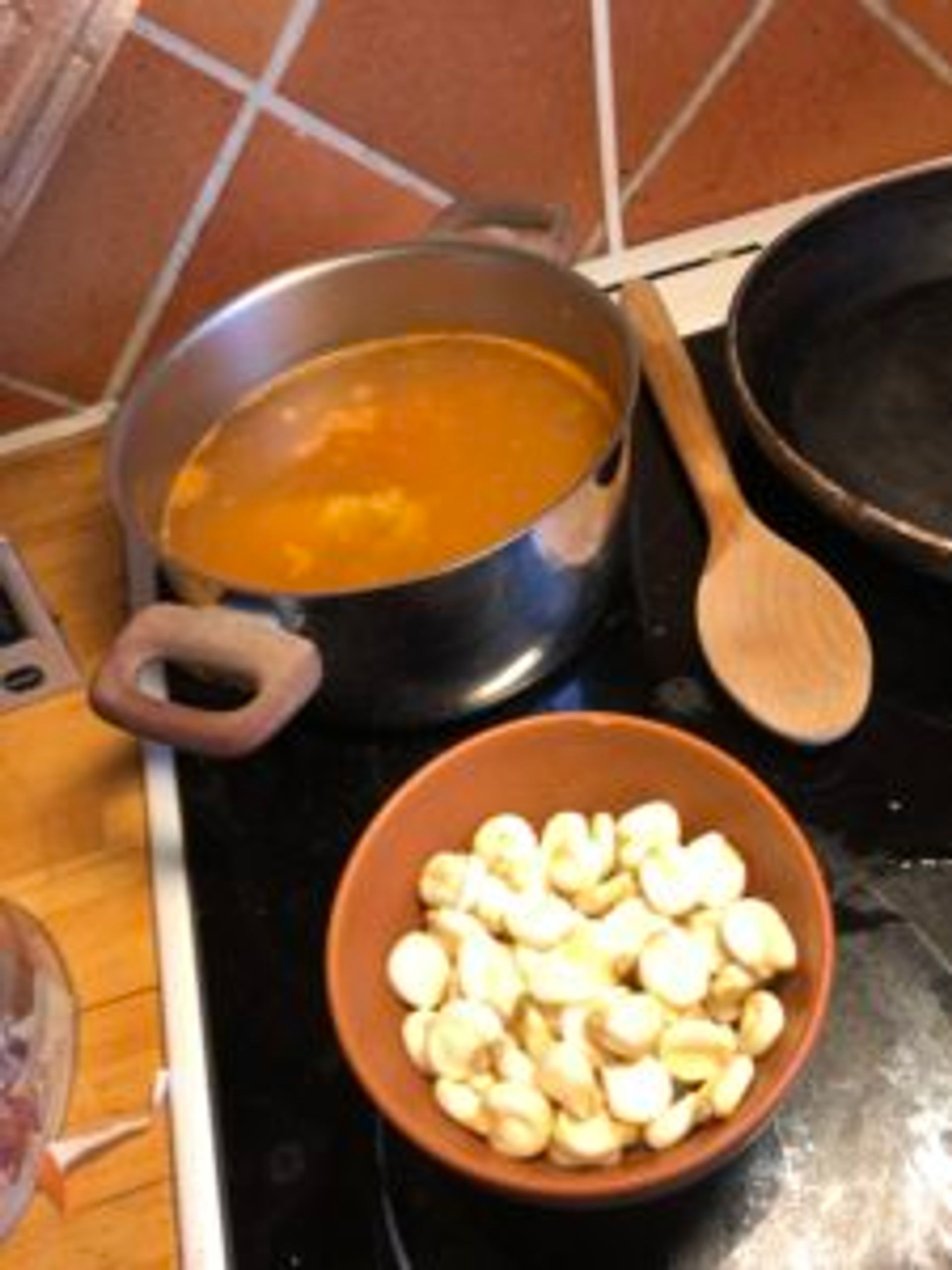 Pots and pans used for cooking a Bolivian dish.