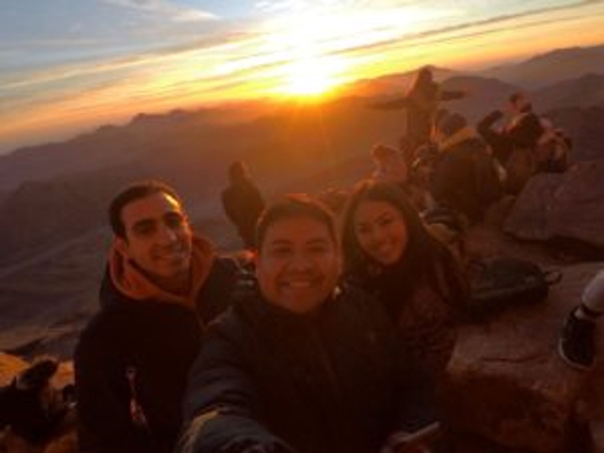 Camilo in Egypt, standing together with friends he made there.