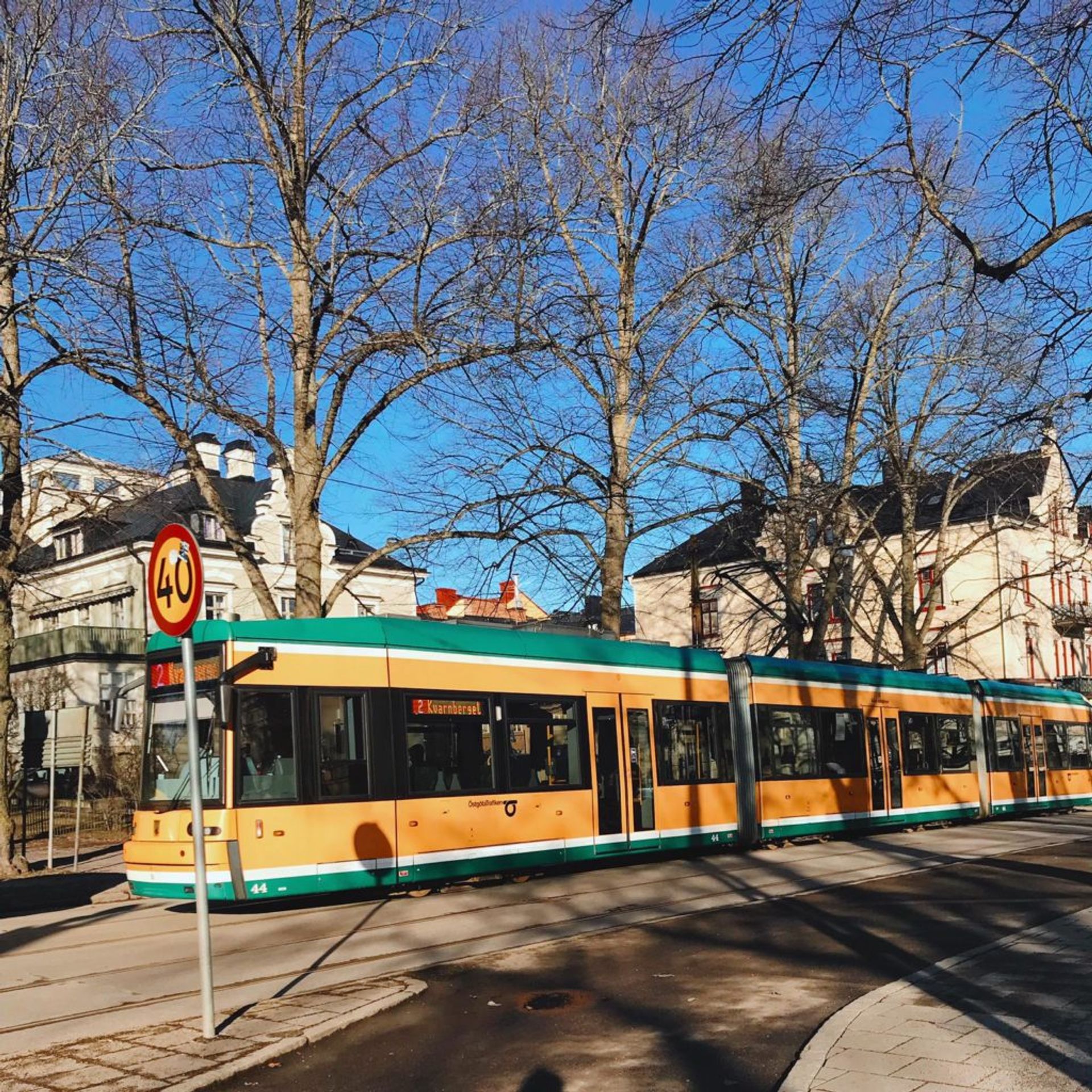 Yellow and green tram.