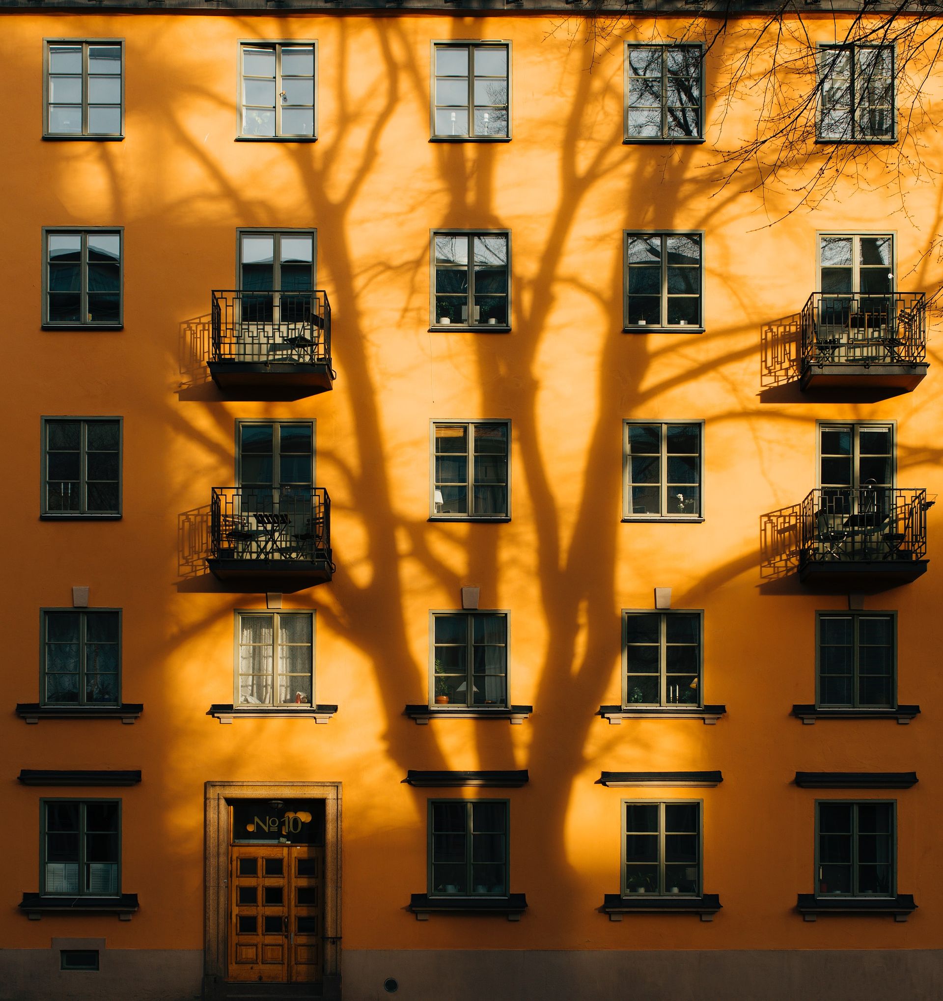 A yellow residential building.