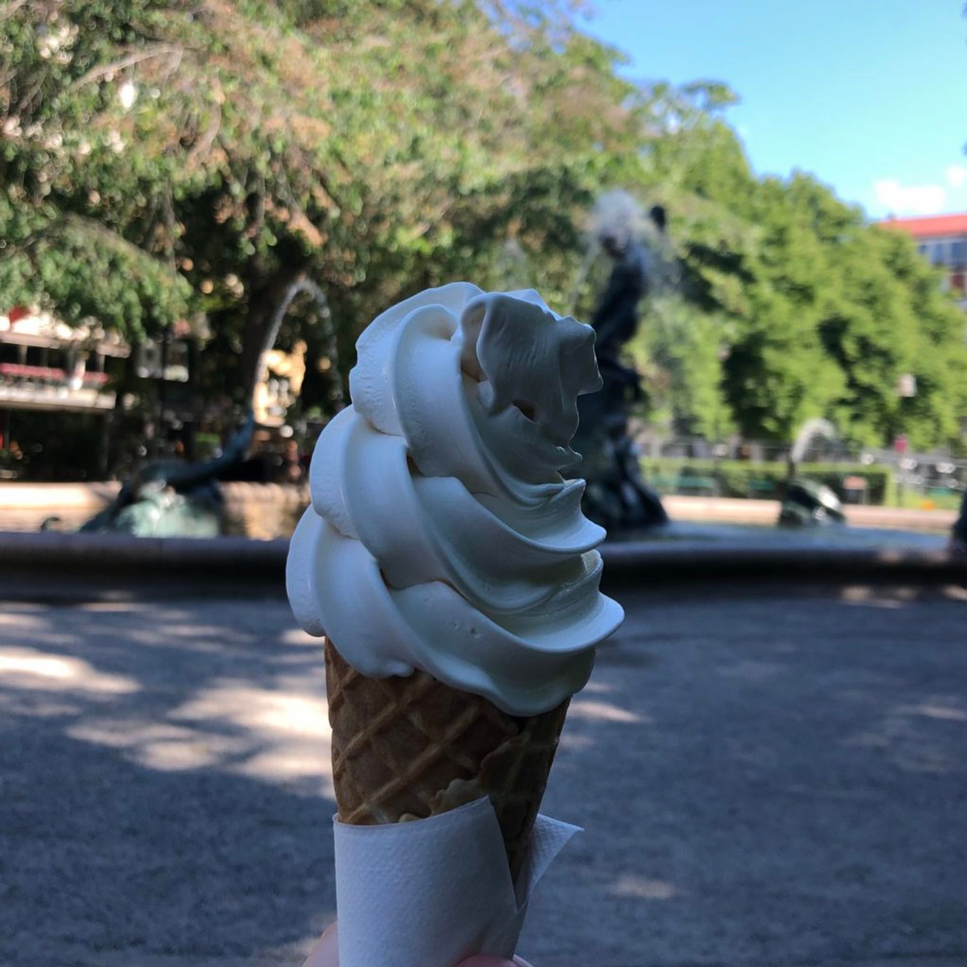 Soft serve ice cream in a cone.