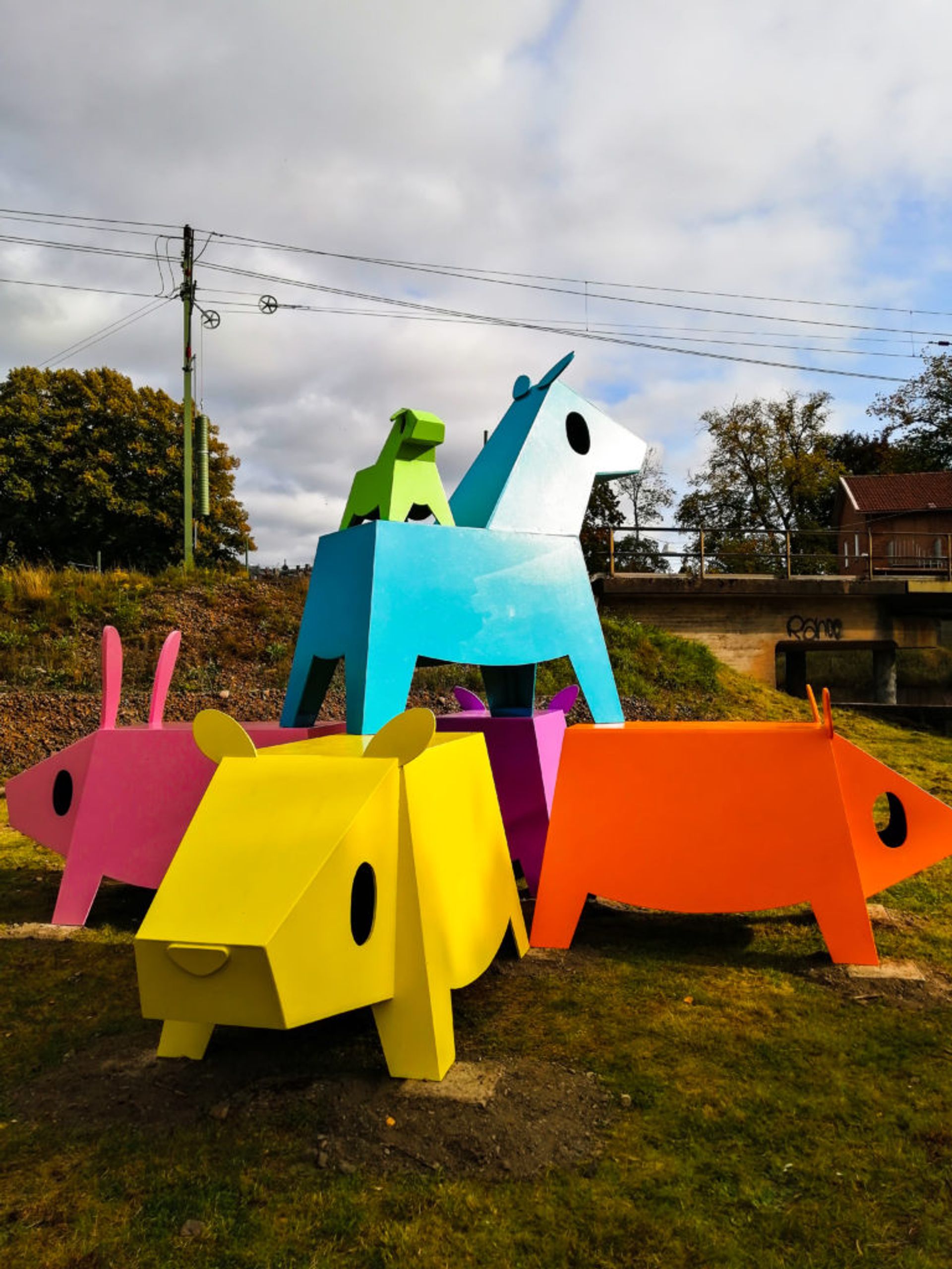 Colourful and childlike sculptures of mammals. 