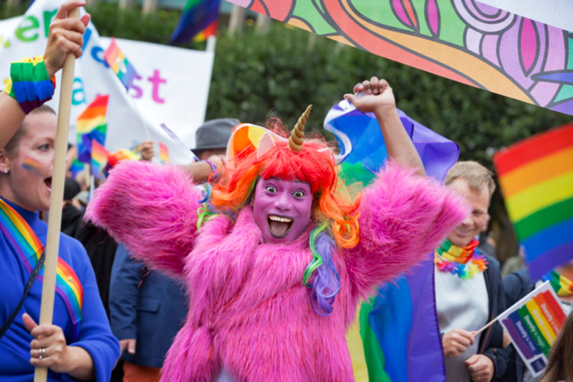 Person dressed as a unicorn at Pride festival