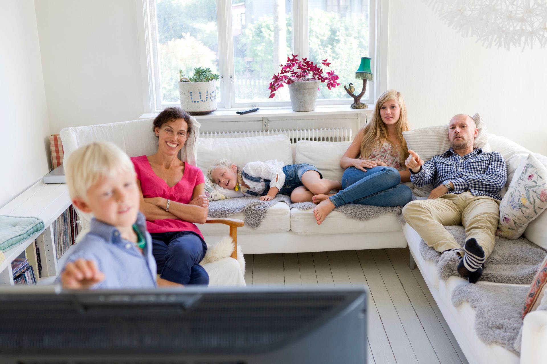 A family watching TV.